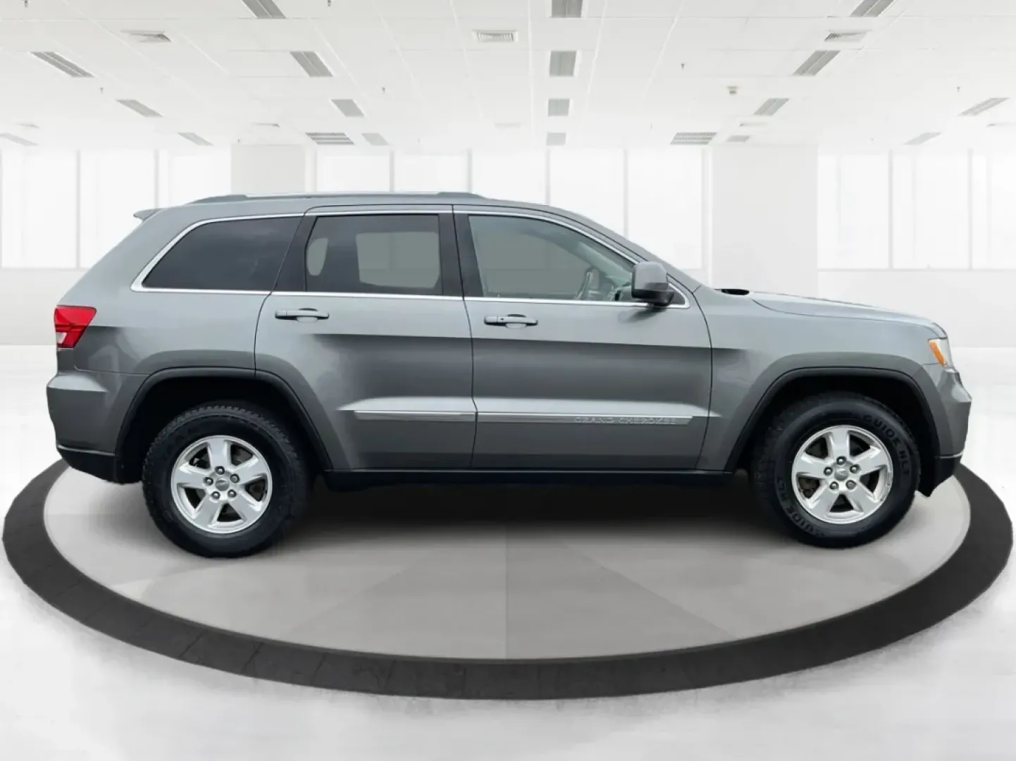 2012 Jeep Grand Cherokee Laredo (1C4RJFAG2CC) with an Other engine, located at 8750 N County Rd 25A, Piqua, OH, 45356, (937) 908-9800, 40.164391, -84.232513 - ### Discover Adventure with the 2012 Jeep Grand Cherokee Laredo at Advantage Car and Credit - Piqua<br /> <br /> Are you ready to tackle your next adventure, whether it's a weekend getaway or daily commutes through Piqua's scenic routes? The 2012 Jeep Grand Cherokee Laredo is the perfect SUV for tho - Photo#1