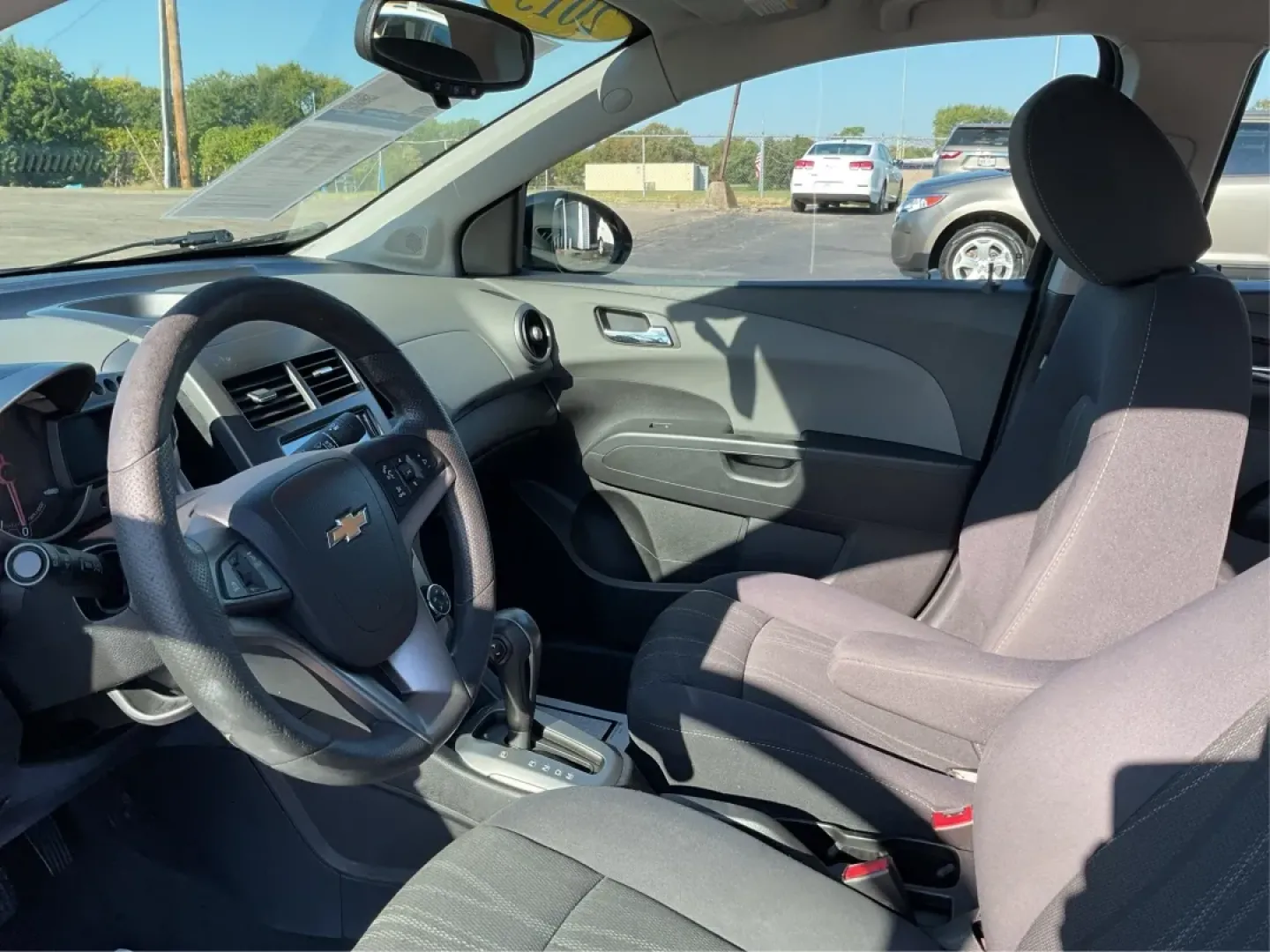 2015 Chevrolet Sonic LT Auto (1G1JC5SG4F4) with an Other engine, located at 401 Woodman Dr, Riverside, OH, 45431, (937) 908-9800, 39.760899, -84.123421 - ### Discover Your Next Adventure with this 2015 Chevrolet Sonic LT Auto!<br /> <br /> Are you searching for a reliable sedan that's perfect for your daily commute or weekend getaways? Look no further than this stunning 2015 Chevrolet Sonic LT Auto, available now at Advantage Car and Credit in Morain - Photo#9