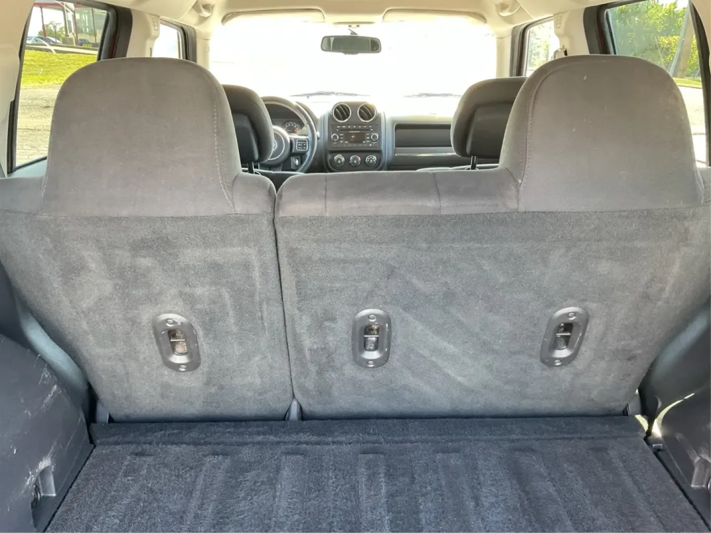 2015 Jeep Patriot Latitude (1C4NJRFB0FD) with an 2.4L I-4 DOHC engine, located at 401 Woodman Dr, Riverside, OH, 45431, (937) 908-9800, 39.760899, -84.123421 - **Adventure Awaits with the 2015 Jeep Patriot Latitude Your Perfect Companion for Every Journey!**<br /> <br /> At Advantage Car and Credit - Riverside, located at 401 Woodman Dr, Riverside, OH 45431, we understand that life is an adventure, whether it's gearing up for a weekend getaway or managing - Photo#12