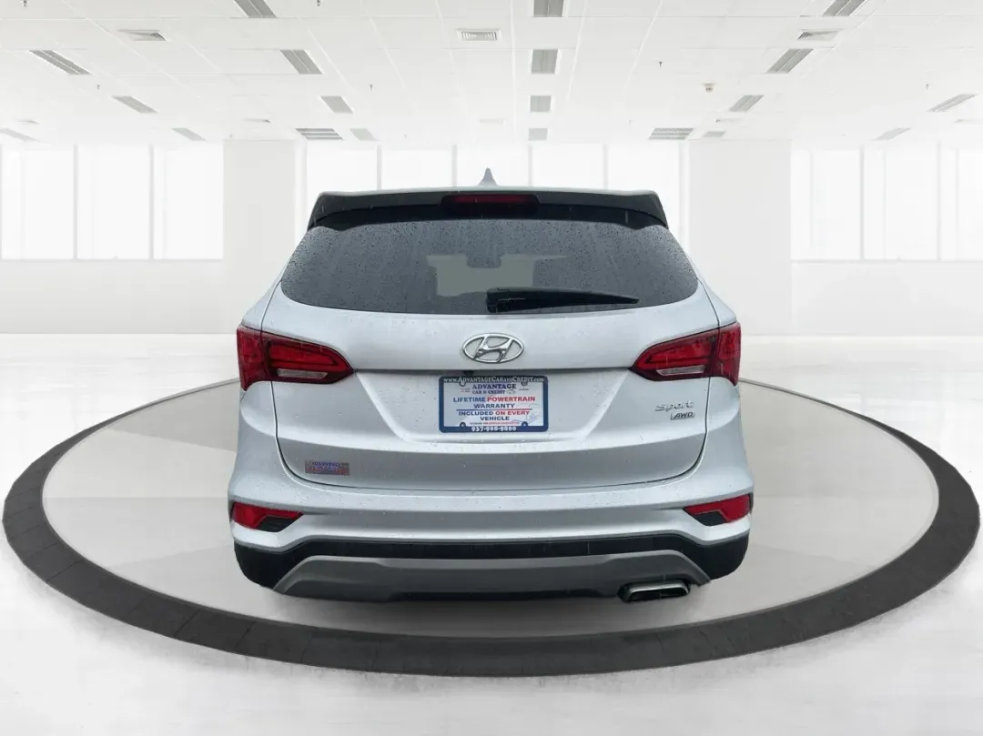 2017 Hyundai Santa Fe 2.4L (5XYZTDLB2HG) with an Theta II 2.4L I-4 gasoline direct injection engine, located at 4508 South Dixie Dr, Moraine, OH, 45439, (937) 908-9800, 39.689976, -84.218452 - Discover the perfect blend of comfort, capability, and style with the 2017 Hyundai Santa Fe, now available at Advantage Car and Credit, located at 1184 Kauffman Ave, Fairborn, OH 45324. This versatile SUV is an excellent choice for growing families, weekend adventurers, or budget-conscious buyers lo - Photo#3
