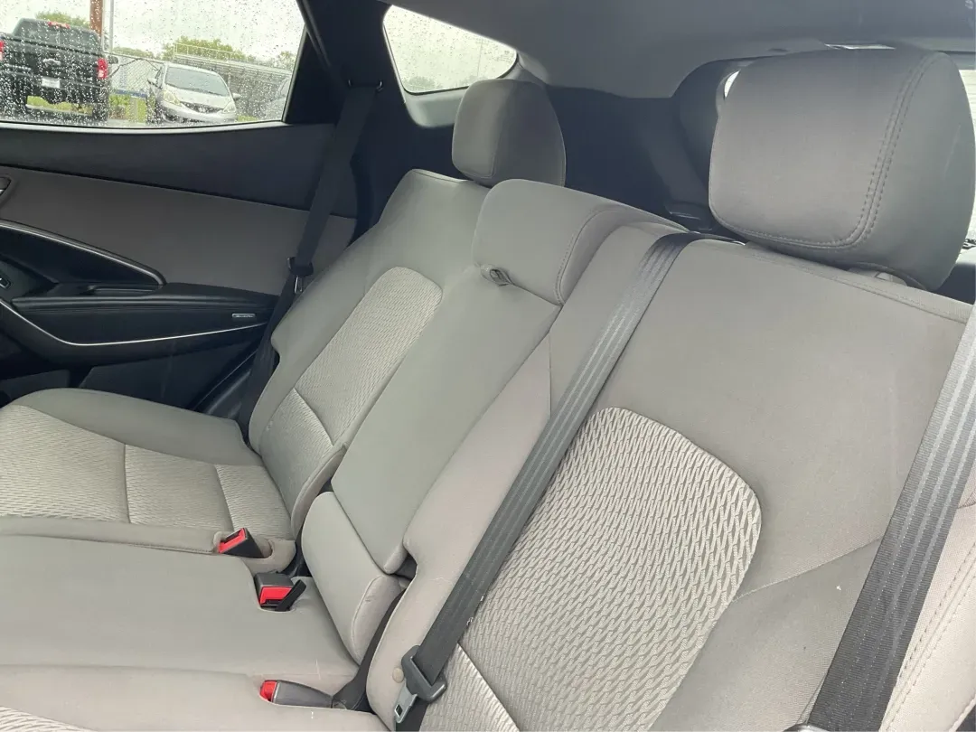 2017 Hyundai Santa Fe 2.4L (5XYZTDLB2HG) with an Theta II 2.4L I-4 gasoline direct injection engine, located at 4508 South Dixie Dr, Moraine, OH, 45439, (937) 908-9800, 39.689976, -84.218452 - Discover the perfect blend of comfort, capability, and style with the 2017 Hyundai Santa Fe, now available at Advantage Car and Credit, located at 1184 Kauffman Ave, Fairborn, OH 45324. This versatile SUV is an excellent choice for growing families, weekend adventurers, or budget-conscious buyers lo - Photo#10