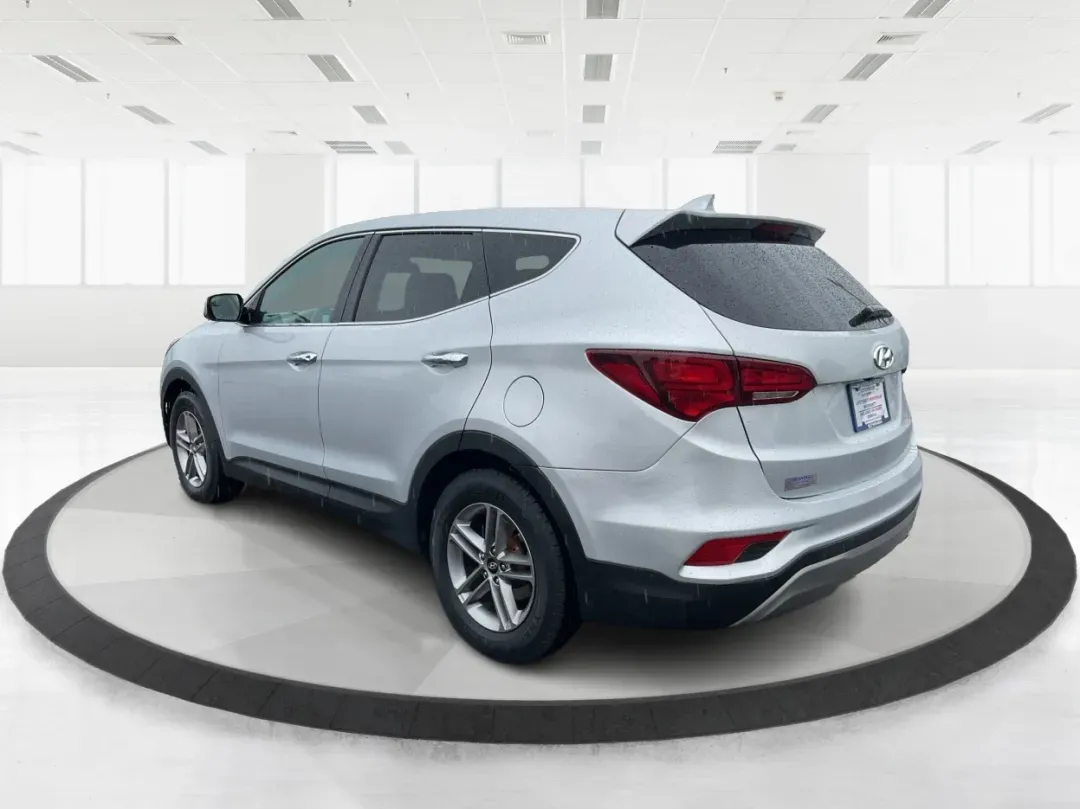 2017 Hyundai Santa Fe 2.4L (5XYZTDLB2HG) with an Theta II 2.4L I-4 gasoline direct injection engine, located at 1951 S Dayton Lakeview Rd., New Carlisle, OH, 45344, (937) 908-9800, 39.890999, -84.050255 - Discover the perfect blend of comfort, capability, and style with the 2017 Hyundai Santa Fe, now available at Advantage Car and Credit, located at 1184 Kauffman Ave, Fairborn, OH 45324. This versatile SUV is an excellent choice for growing families, weekend adventurers, or budget-conscious buyers lo - Photo#4