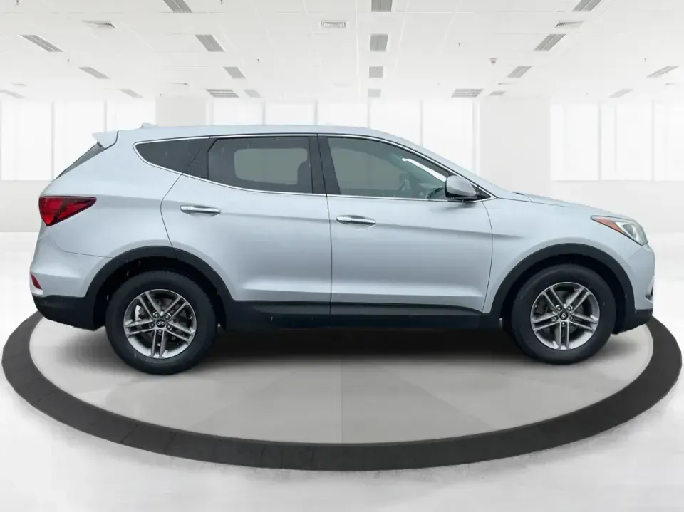 2017 Hyundai Santa Fe 2.4L (5XYZTDLB2HG) with an Theta II 2.4L I-4 gasoline direct injection engine, 6A transmission, located at 1951 S Dayton Lakeview Rd., New Carlisle, OH, 45344, (937) 908-9800, 39.890999, -84.050255 - Discover the perfect blend of comfort, capability, and style with the 2017 Hyundai Santa Fe, now available at Advantage Car and Credit, located at 1184 Kauffman Ave, Fairborn, OH 45324. This versatile SUV is an excellent choice for growing families, weekend adventurers, or budget-conscious buyers lo - Photo#1