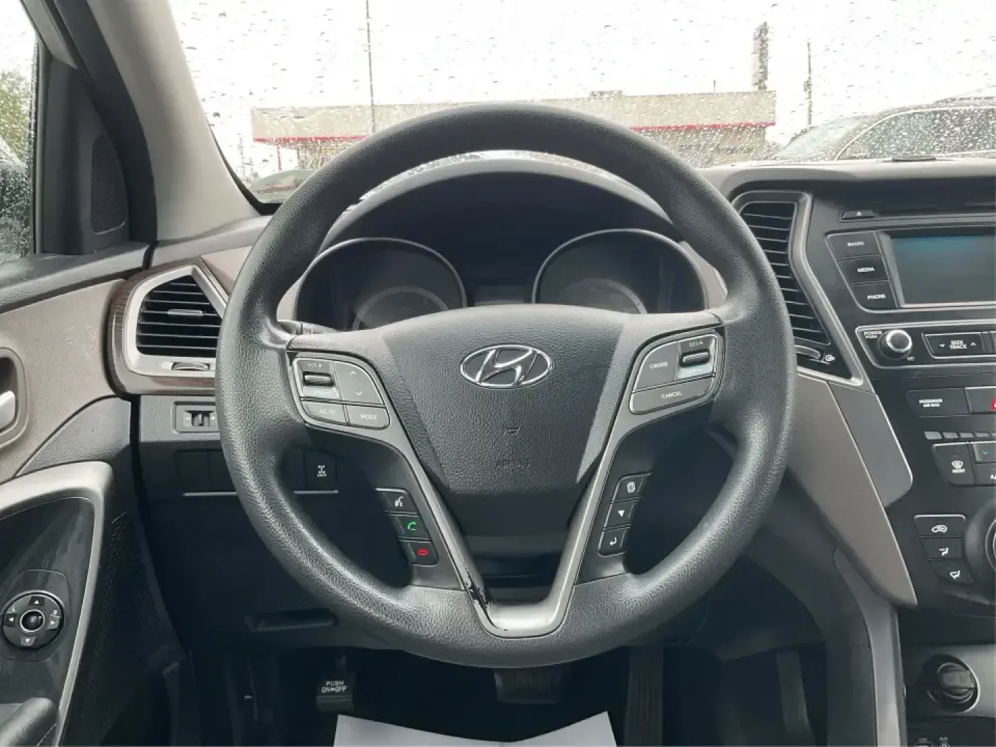 2017 Hyundai Santa Fe 2.4L (5XYZTDLB2HG) with an Theta II 2.4L I-4 gasoline direct injection engine, 6A transmission, located at 8750 N County Rd 25A, Piqua, OH, 45356, (937) 908-9800, 40.164391, -84.232513 - Discover the perfect blend of comfort, capability, and style with the 2017 Hyundai Santa Fe, now available at Advantage Car and Credit, located at 1184 Kauffman Ave, Fairborn, OH 45324. This versatile SUV is an excellent choice for growing families, weekend adventurers, or budget-conscious buyers lo - Photo#16