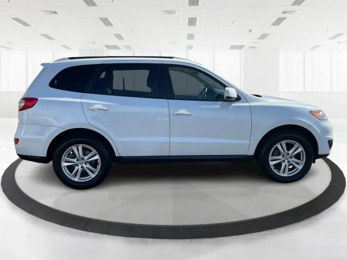 2012 Hyundai Santa Fe Limited V6 (5XYZK4AGXCG) with an 3.5L V-6 DOHC engine, located at 880 E. National Road, Vandalia, OH, 45377, (937) 908-9800, 39.891918, -84.183594 - **Adventure Awaits with This 2012 Hyundai Santa Fe Limited V6!**<br /> <br /> If you're in the market for a reliable SUV that effortlessly blends style, comfort, and capability, look no further than this stunning 2012 Hyundai Santa Fe Limited V6. Perfect for growing families, weekend adventures, or - Photo#1