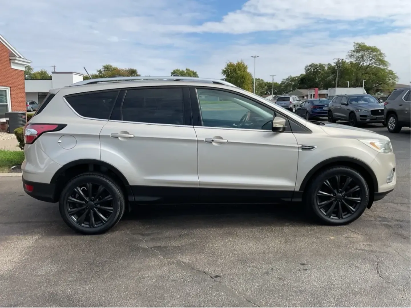 2018 Ford Escape Titanium FWD (1FMCU0J99JU) with an 2.0L L4 DOHC 16V engine, 6-Speed Automatic transmission, located at 1230 East Main St, Xenia, OH, 45385, (937) 908-9800, 39.688026, -83.910172 - Experience the perfect blend of style and practicality with the 2018 Ford Escape Titanium, now available at Advantage Car and Credit in Xenia, OH. This SUV is not just a vehicle; it's your ticket to adventure, whether you're navigating the bustling streets of downtown Xenia or embarking on a weekend - Photo#1