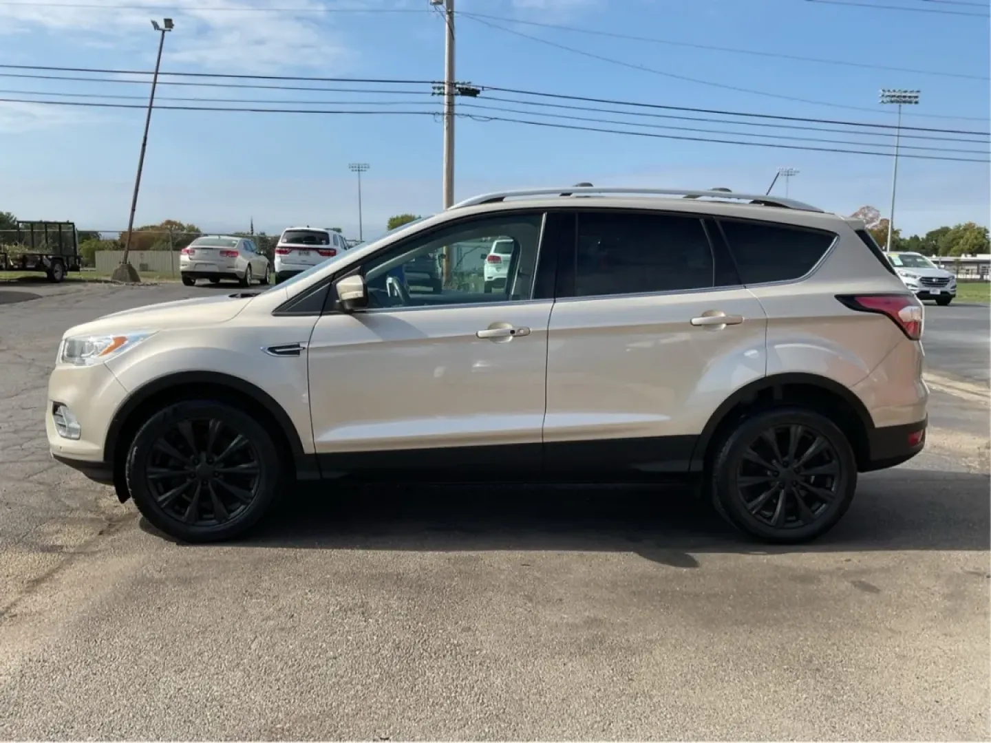 2018 Ford Escape Titanium FWD (1FMCU0J99JU) with an 2.0L L4 DOHC 16V engine, 6-Speed Automatic transmission, located at 1230 East Main St, Xenia, OH, 45385, (937) 908-9800, 39.688026, -83.910172 - Experience the perfect blend of style and practicality with the 2018 Ford Escape Titanium, now available at Advantage Car and Credit in Xenia, OH. This SUV is not just a vehicle; it's your ticket to adventure, whether you're navigating the bustling streets of downtown Xenia or embarking on a weekend - Photo#5