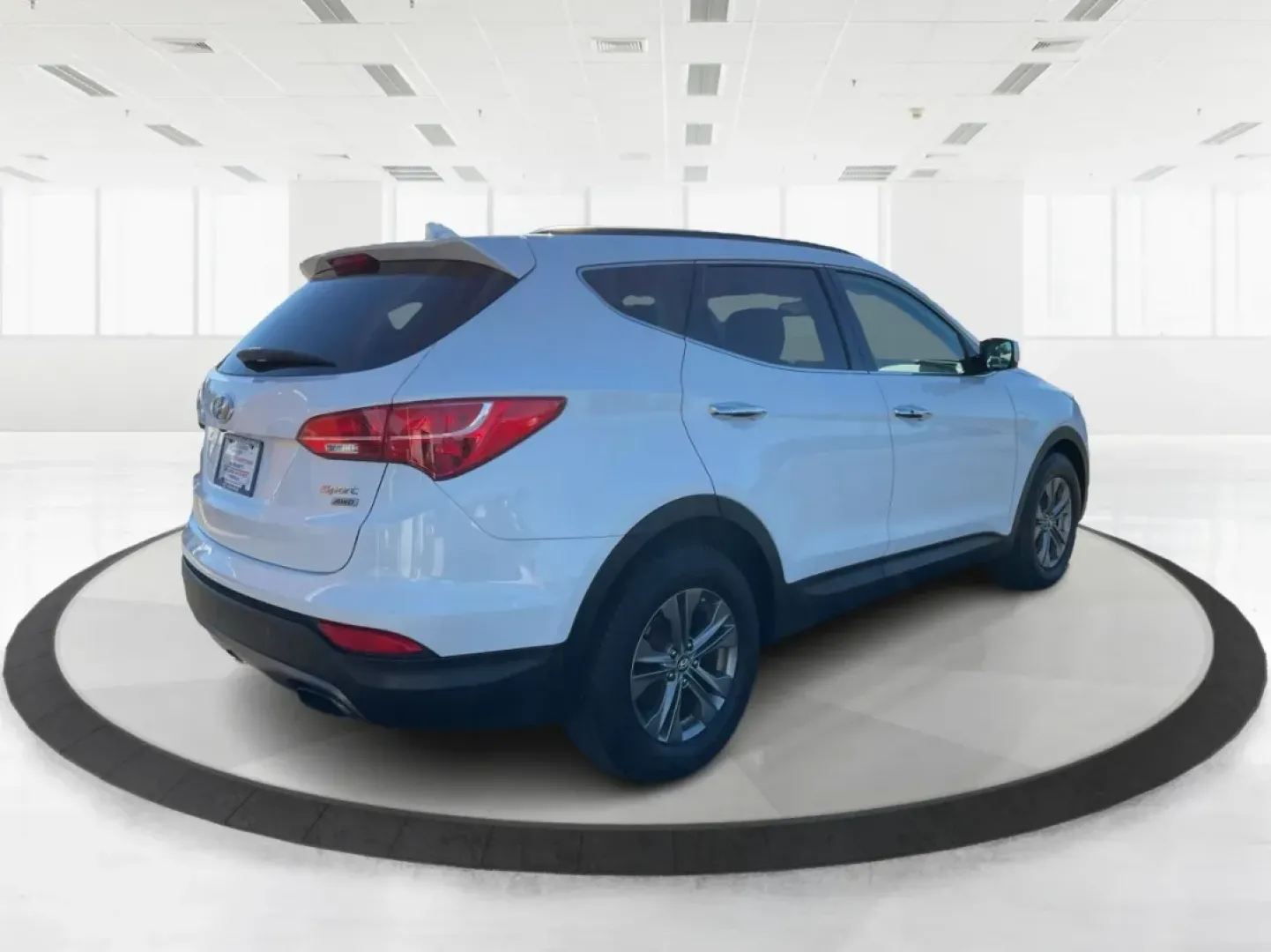 2014 Hyundai Santa Fe 2.4L (5XYZUDLB3EG) with an Theta II 2.4L I-4 gasoline direct injection engine, located at 1099 N County Rd 25A , Troy, OH, 45373, (937) 908-9800, 40.057079, -84.212883 - Are you ready to elevate your driving experience and embrace a lifestyle of adventure? The 2014 Hyundai Santa Fe available at Advantage Car and Credit in Troy, OH, is not just a vehicle; it's your gateway to unforgettable road trips, family outings, and daily commutes. This versatile SUV combines st - Photo#2