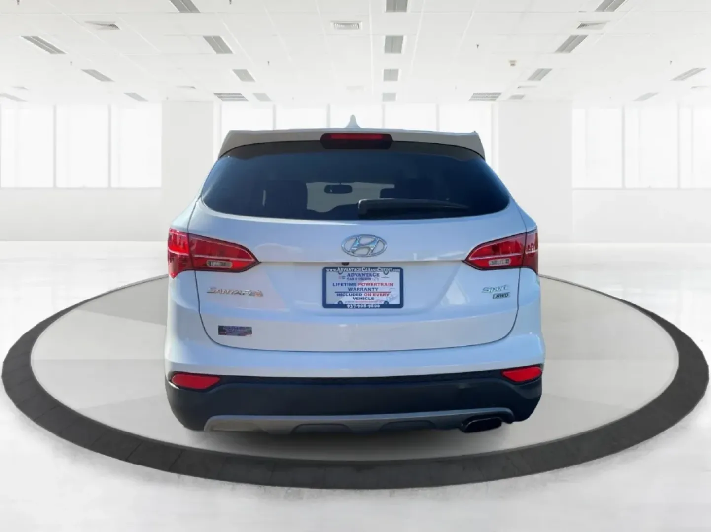 2014 Hyundai Santa Fe 2.4L (5XYZUDLB3EG) with an Theta II 2.4L I-4 gasoline direct injection engine, located at 1099 N County Rd 25A , Troy, OH, 45373, (937) 908-9800, 40.057079, -84.212883 - Are you ready to elevate your driving experience and embrace a lifestyle of adventure? The 2014 Hyundai Santa Fe available at Advantage Car and Credit in Troy, OH, is not just a vehicle; it's your gateway to unforgettable road trips, family outings, and daily commutes. This versatile SUV combines st - Photo#3