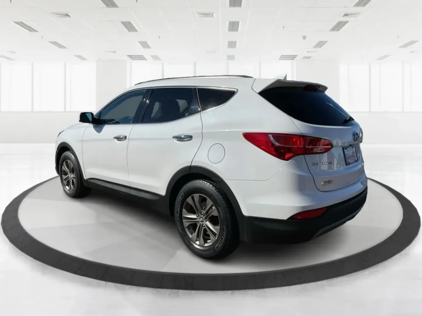 2014 Hyundai Santa Fe 2.4L (5XYZUDLB3EG) with an Theta II 2.4L I-4 gasoline direct injection engine, located at 1099 N County Rd 25A , Troy, OH, 45373, (937) 908-9800, 40.057079, -84.212883 - Are you ready to elevate your driving experience and embrace a lifestyle of adventure? The 2014 Hyundai Santa Fe available at Advantage Car and Credit in Troy, OH, is not just a vehicle; it's your gateway to unforgettable road trips, family outings, and daily commutes. This versatile SUV combines st - Photo#4