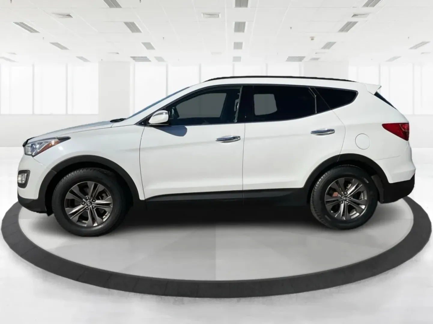 2014 Hyundai Santa Fe 2.4L (5XYZUDLB3EG) with an Theta II 2.4L I-4 gasoline direct injection engine, located at 1099 N County Rd 25A , Troy, OH, 45373, (937) 908-9800, 40.057079, -84.212883 - Are you ready to elevate your driving experience and embrace a lifestyle of adventure? The 2014 Hyundai Santa Fe available at Advantage Car and Credit in Troy, OH, is not just a vehicle; it's your gateway to unforgettable road trips, family outings, and daily commutes. This versatile SUV combines st - Photo#5