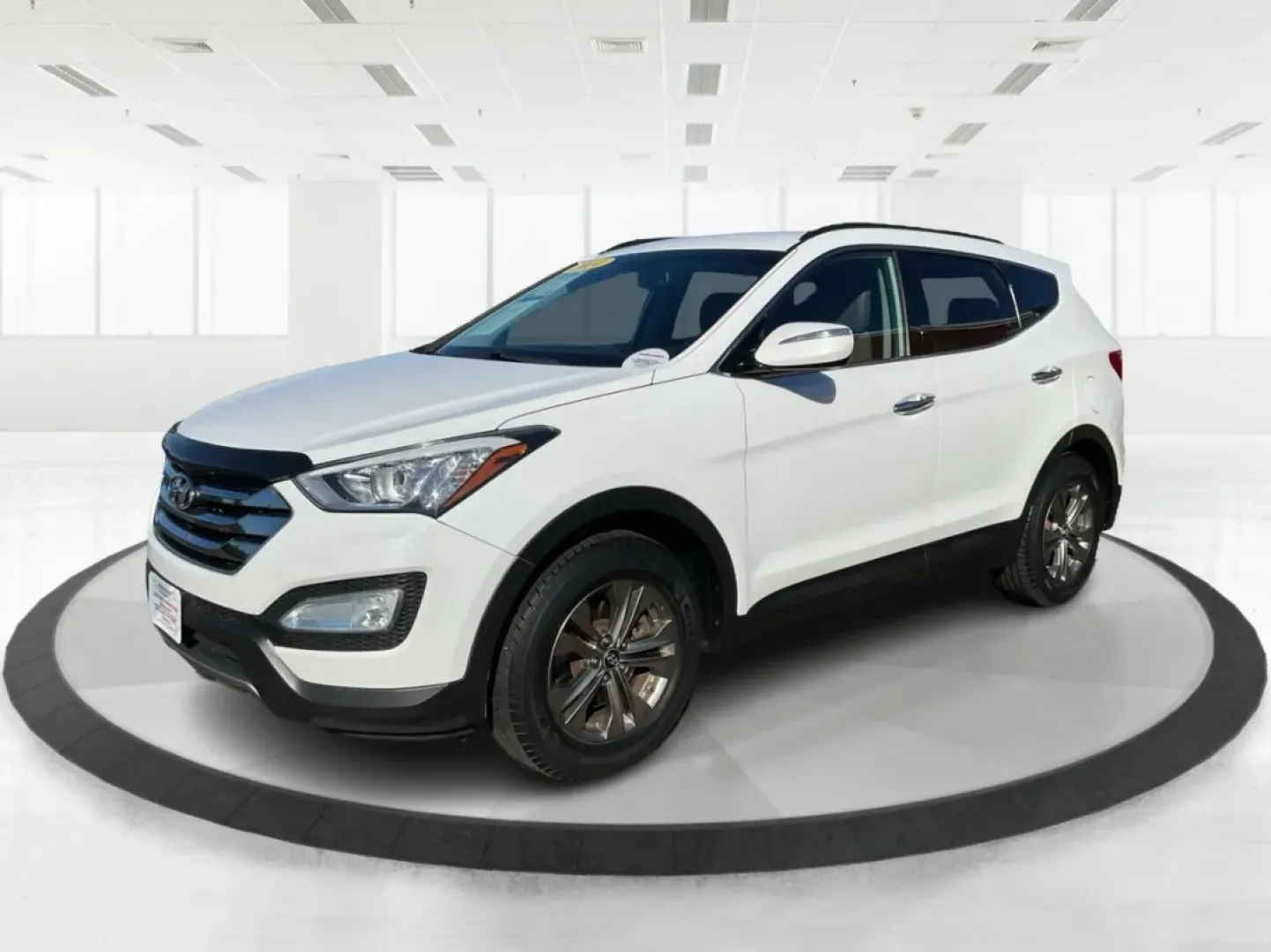 2014 Hyundai Santa Fe 2.4L (5XYZUDLB3EG) with an Theta II 2.4L I-4 gasoline direct injection engine, located at 1099 N County Rd 25A , Troy, OH, 45373, (937) 908-9800, 40.057079, -84.212883 - Are you ready to elevate your driving experience and embrace a lifestyle of adventure? The 2014 Hyundai Santa Fe available at Advantage Car and Credit in Troy, OH, is not just a vehicle; it's your gateway to unforgettable road trips, family outings, and daily commutes. This versatile SUV combines st - Photo#8