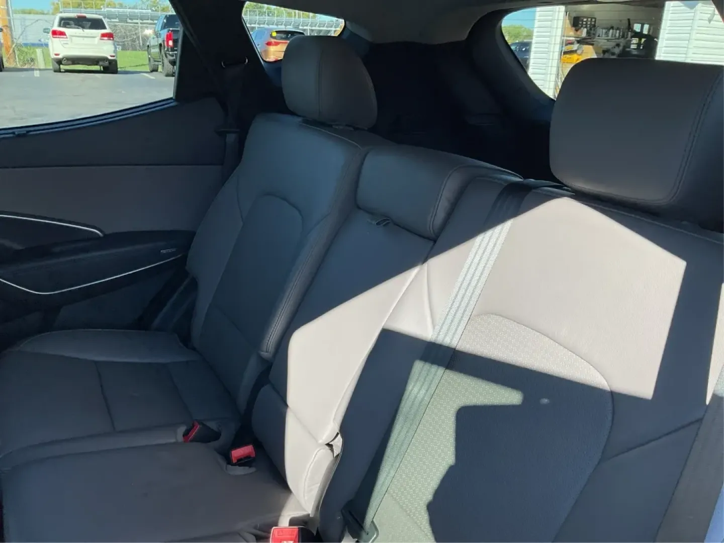 2014 Hyundai Santa Fe 2.4L (5XYZUDLB3EG) with an Theta II 2.4L I-4 gasoline direct injection engine, located at 1099 N County Rd 25A , Troy, OH, 45373, (937) 908-9800, 40.057079, -84.212883 - Are you ready to elevate your driving experience and embrace a lifestyle of adventure? The 2014 Hyundai Santa Fe available at Advantage Car and Credit in Troy, OH, is not just a vehicle; it's your gateway to unforgettable road trips, family outings, and daily commutes. This versatile SUV combines st - Photo#10