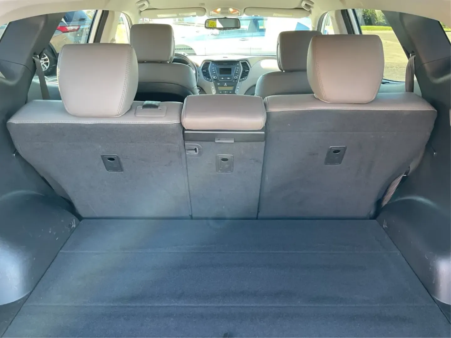 2014 Hyundai Santa Fe 2.4L (5XYZUDLB3EG) with an Theta II 2.4L I-4 gasoline direct injection engine, located at 1099 N County Rd 25A , Troy, OH, 45373, (937) 908-9800, 40.057079, -84.212883 - Are you ready to elevate your driving experience and embrace a lifestyle of adventure? The 2014 Hyundai Santa Fe available at Advantage Car and Credit in Troy, OH, is not just a vehicle; it's your gateway to unforgettable road trips, family outings, and daily commutes. This versatile SUV combines st - Photo#12