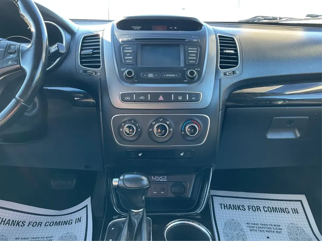 2015 Kia Sorento LX (5XYKTCA66FG) with an 2.4L I-4 gasoline direct injection engine, located at 4508 South Dixie Dr, Moraine, OH, 45439, (937) 908-9800, 39.689976, -84.218452 - **Adventure Awaits with the 2015 Kia Sorento LX from Advantage Car and Credit!**<br /> <br /> Are you ready to elevate your family outings or embark on unforgettable weekend adventures? Look no further than this stunning **2015 Kia Sorento LX**! With its striking Remington Red Metallic exterior and - Photo#13