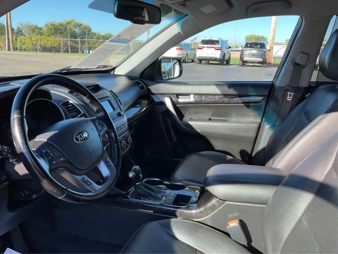 2015 Kia Sorento LX (5XYKTCA66FG) with an 2.4L I-4 gasoline direct injection engine, 6-Speed Automatic transmission, located at 4508 South Dixie Dr, Moraine, OH, 45439, (937) 908-9800, 39.689976, -84.218452 - **Adventure Awaits with the 2015 Kia Sorento LX from Advantage Car and Credit!**<br /> <br /> Are you ready to elevate your family outings or embark on unforgettable weekend adventures? Look no further than this stunning **2015 Kia Sorento LX**! With its striking Remington Red Metallic exterior and - Photo#9