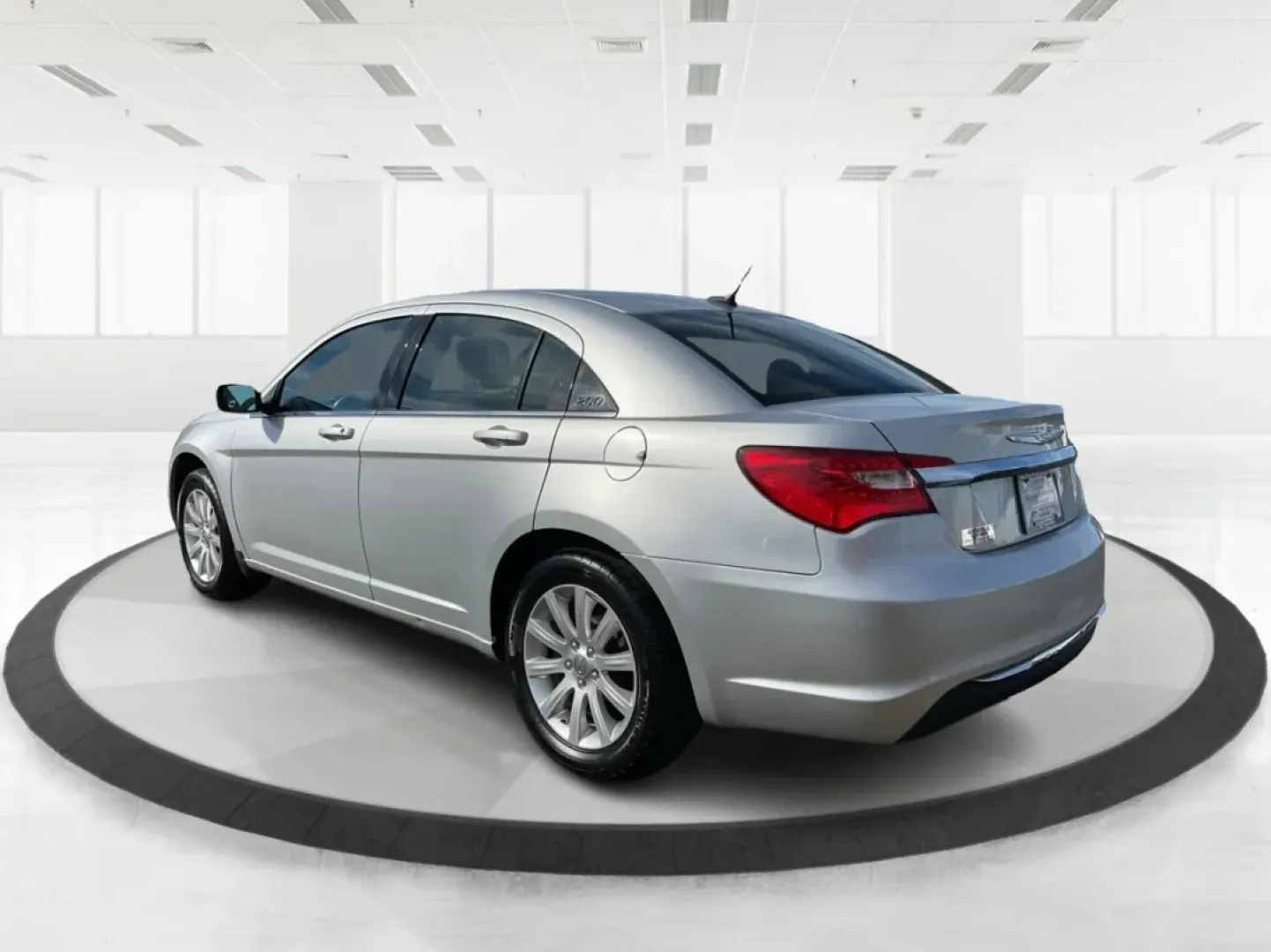 2012 Chrysler 200 Touring (1C3CCBBB6CN) with an Other engine, located at 1184 Kauffman Ave, Fairborn, OH, 45324, (937) 908-9800, 39.807072, -84.030914 - **Discover Your Next Adventure with the 2012 Chrysler 200 Touring at Advantage Car and Credit - Fairborn!**<br /> <br /> Are you searching for the perfect vehicle to elevate your daily commute or family road trips? Look no further! The 2012 Chrysler 200 Touring, available at Advantage Car and Credit - Photo#4