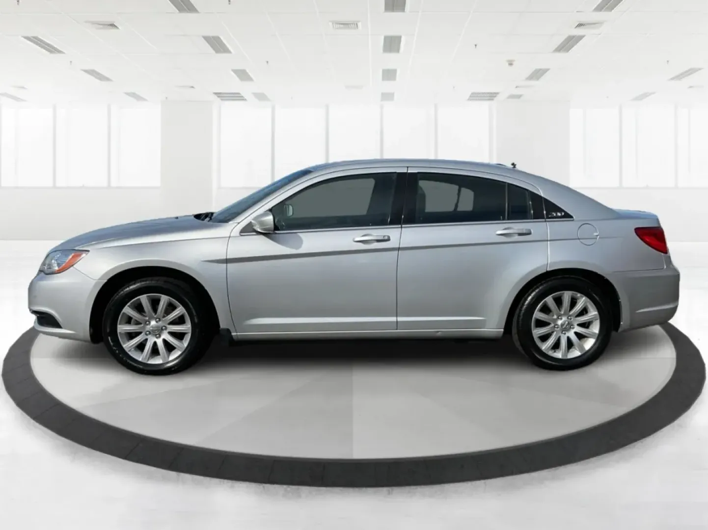 2012 Chrysler 200 Touring (1C3CCBBB6CN) with an Other engine, located at 1184 Kauffman Ave, Fairborn, OH, 45324, (937) 908-9800, 39.807072, -84.030914 - **Discover Your Next Adventure with the 2012 Chrysler 200 Touring at Advantage Car and Credit - Fairborn!**<br /> <br /> Are you searching for the perfect vehicle to elevate your daily commute or family road trips? Look no further! The 2012 Chrysler 200 Touring, available at Advantage Car and Credit - Photo#5