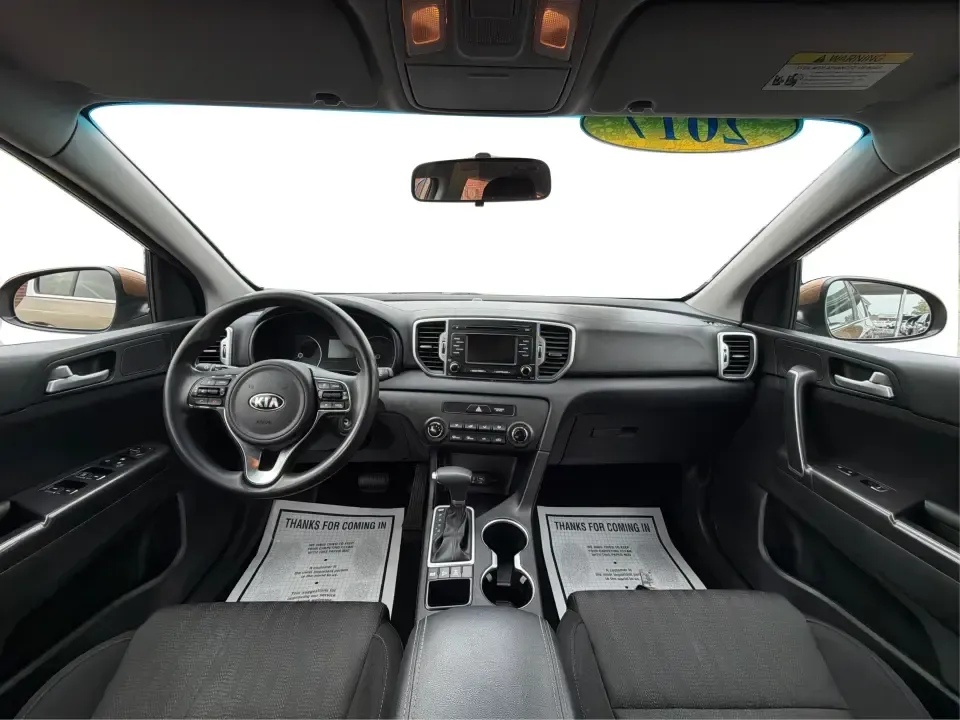 2017 Kia Sportage LX AWD (KNDPMCAC2H7) with an 2.4L V6 DOHC 24V engine, 6A transmission, located at 8750 N County Rd 25A, Piqua, OH, 45356, (937) 908-9800, 40.164391, -84.232513 - Picture a weekend that starts with soccer drop-off in Piqua, turns into a quick Costco run, and still leaves room for a sunset drive toward the Miami Valley-this 2017 Kia Sportage LX AWD is the kind of crossover that fits real-life schedules. With seating for five, confident all-wheel drive, and a v- Photo#19