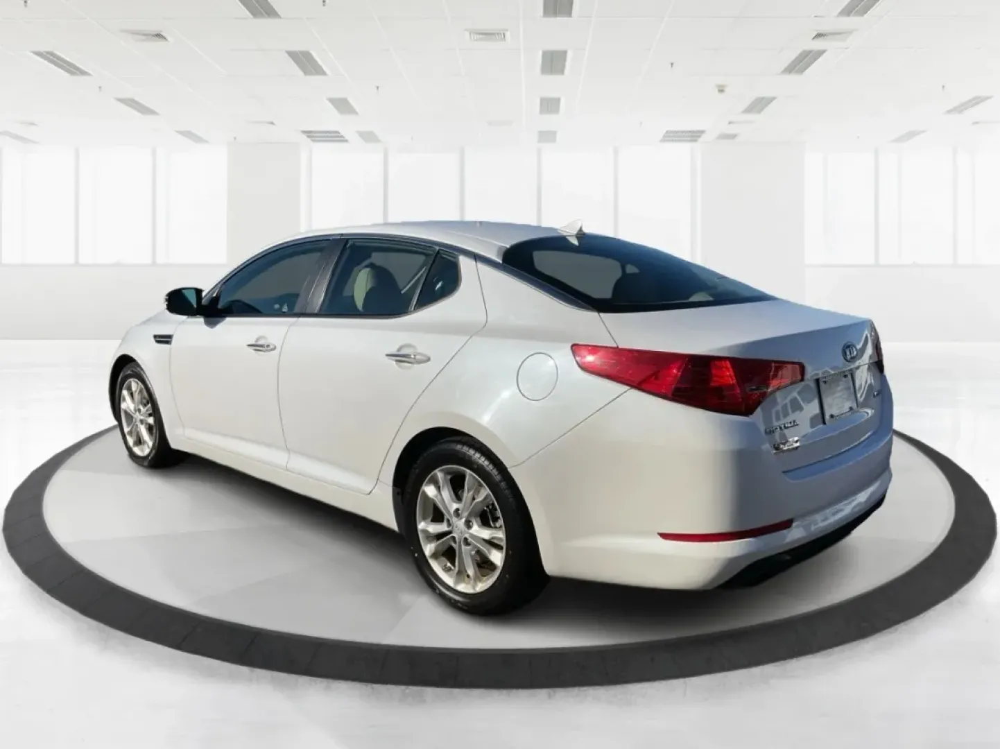 2012 Kia Optima EX (5XXGN4A70CG) with an 2.4L I-4 gasoline direct injection engine, located at 1099 N County Rd 25A , Troy, OH, 45373, (937) 908-9800, 40.057079, -84.212883 - Elevate your driving experience with this stunning 2012 Kia Optima EX, a perfect blend of style, comfort, and reliability. Ideal for budget-conscious buyers and growing families alike, this sedan is designed to meet your daily commuting needs while offering the space and features essential for both - Photo#4