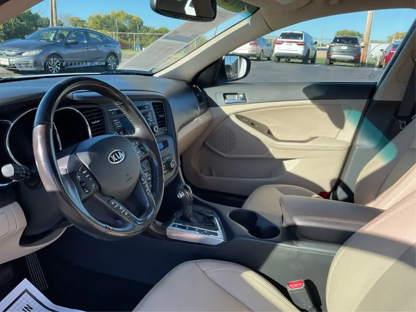 2012 Kia Optima EX (5XXGN4A70CG) with an 2.4L I-4 gasoline direct injection engine, located at 1951 S Dayton Lakeview Rd., New Carlisle, OH, 45344, (937) 908-9800, 39.890999, -84.050255 - Elevate your driving experience with this stunning 2012 Kia Optima EX, a perfect blend of style, comfort, and reliability. Ideal for budget-conscious buyers and growing families alike, this sedan is designed to meet your daily commuting needs while offering the space and features essential for both - Photo#9