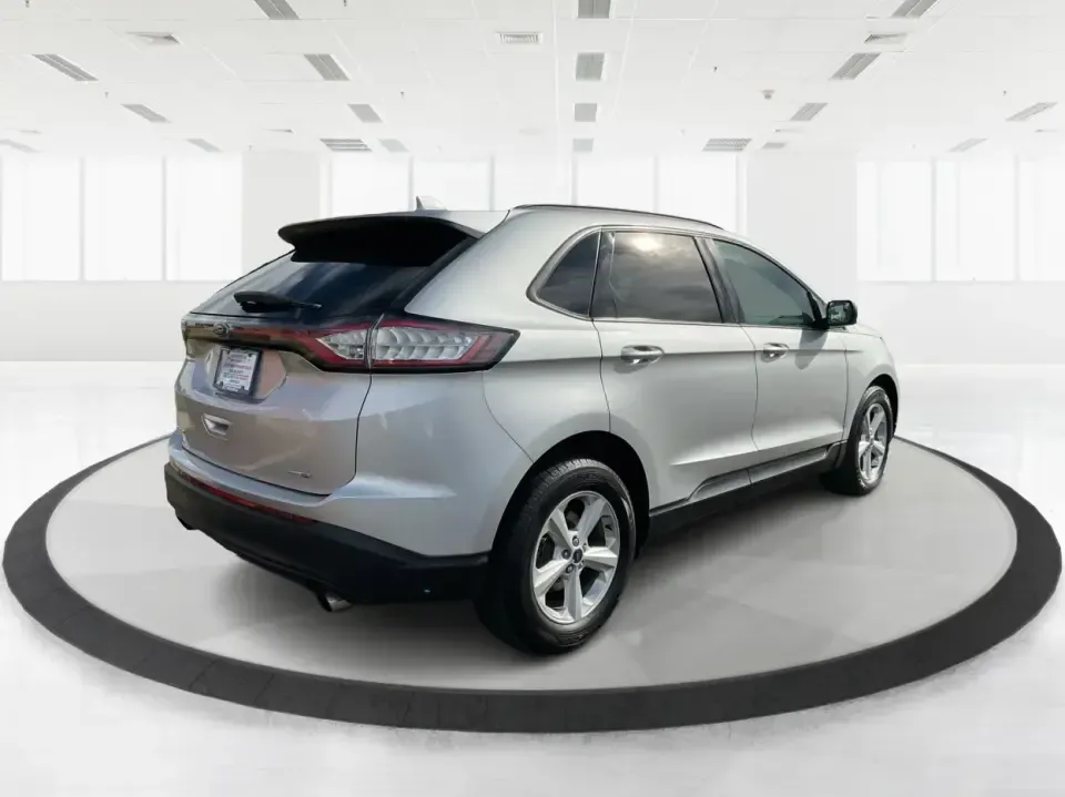 2016 Ford Edge SE (2FMPK4G9XGB) with an EcoBoost 2L I-4 gasoline direct injection engine, 6A transmission, located at 1099 N County Rd 25A , Troy, OH, 45373, (937) 908-9800, 40.057079, -84.212883 - Rev up your lifestyle with the perfect blend of style, comfort, and utility that the 2016 Ford Edge SE offers! If you're looking for a reliable SUV that seamlessly fits into your busy life-whether it's taking the kids to school, embarking on family adventures, or handling your daily commute-this veh - Photo#2