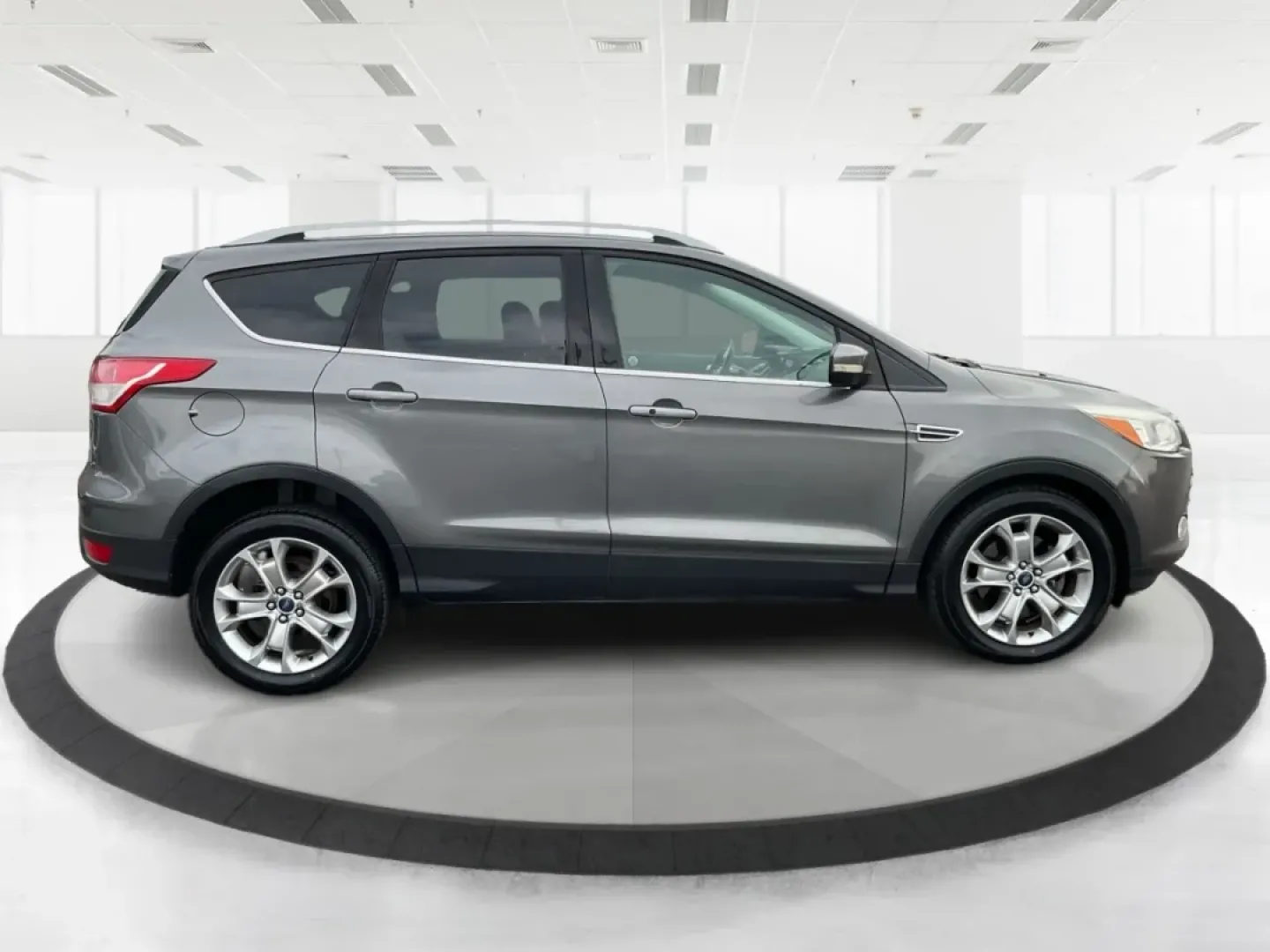 2014 Ford Escape Titanium (1FMCU9J97EU) with an Other engine, located at 401 Woodman Dr, Riverside, OH, 45431, (937) 908-9800, 39.760899, -84.123421 - **Upgrade Your Adventures with the 2014 Ford Escape Titanium at Advantage Car and Credit - Riverside!**<br /> <br /> Are you ready to elevate your weekend getaways or daily commutes with a versatile and stylish SUV? Look no further than the 2014 Ford Escape Titanium, available now at Advantage Car a - Photo#1