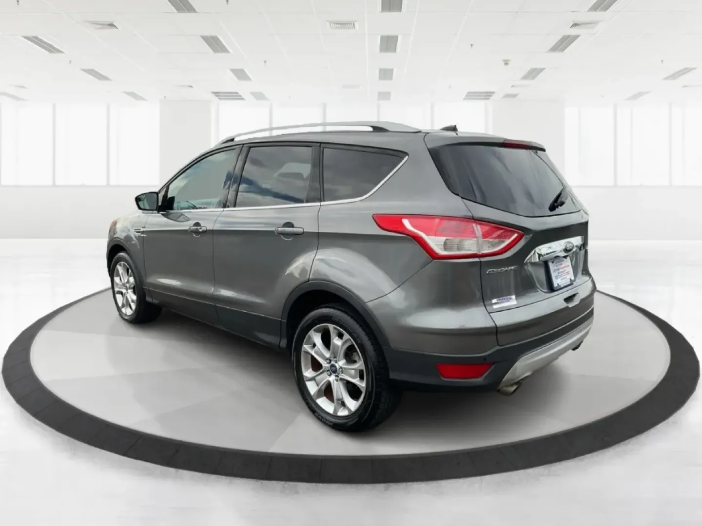 2014 Ford Escape Titanium (1FMCU9J97EU) with an Other engine, located at 401 Woodman Dr, Riverside, OH, 45431, (937) 908-9800, 39.760899, -84.123421 - **Upgrade Your Adventures with the 2014 Ford Escape Titanium at Advantage Car and Credit - Riverside!**<br /> <br /> Are you ready to elevate your weekend getaways or daily commutes with a versatile and stylish SUV? Look no further than the 2014 Ford Escape Titanium, available now at Advantage Car a - Photo#4