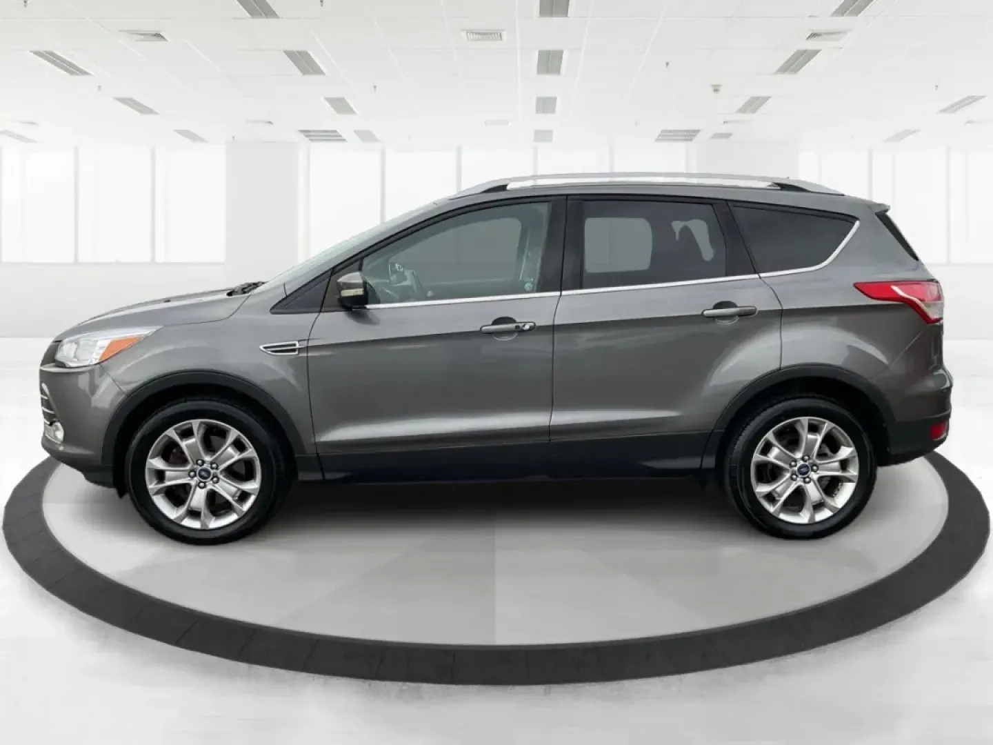 2014 Ford Escape Titanium (1FMCU9J97EU) with an Other engine, located at 401 Woodman Dr, Riverside, OH, 45431, (937) 908-9800, 39.760899, -84.123421 - **Upgrade Your Adventures with the 2014 Ford Escape Titanium at Advantage Car and Credit - Riverside!**<br /> <br /> Are you ready to elevate your weekend getaways or daily commutes with a versatile and stylish SUV? Look no further than the 2014 Ford Escape Titanium, available now at Advantage Car a - Photo#5