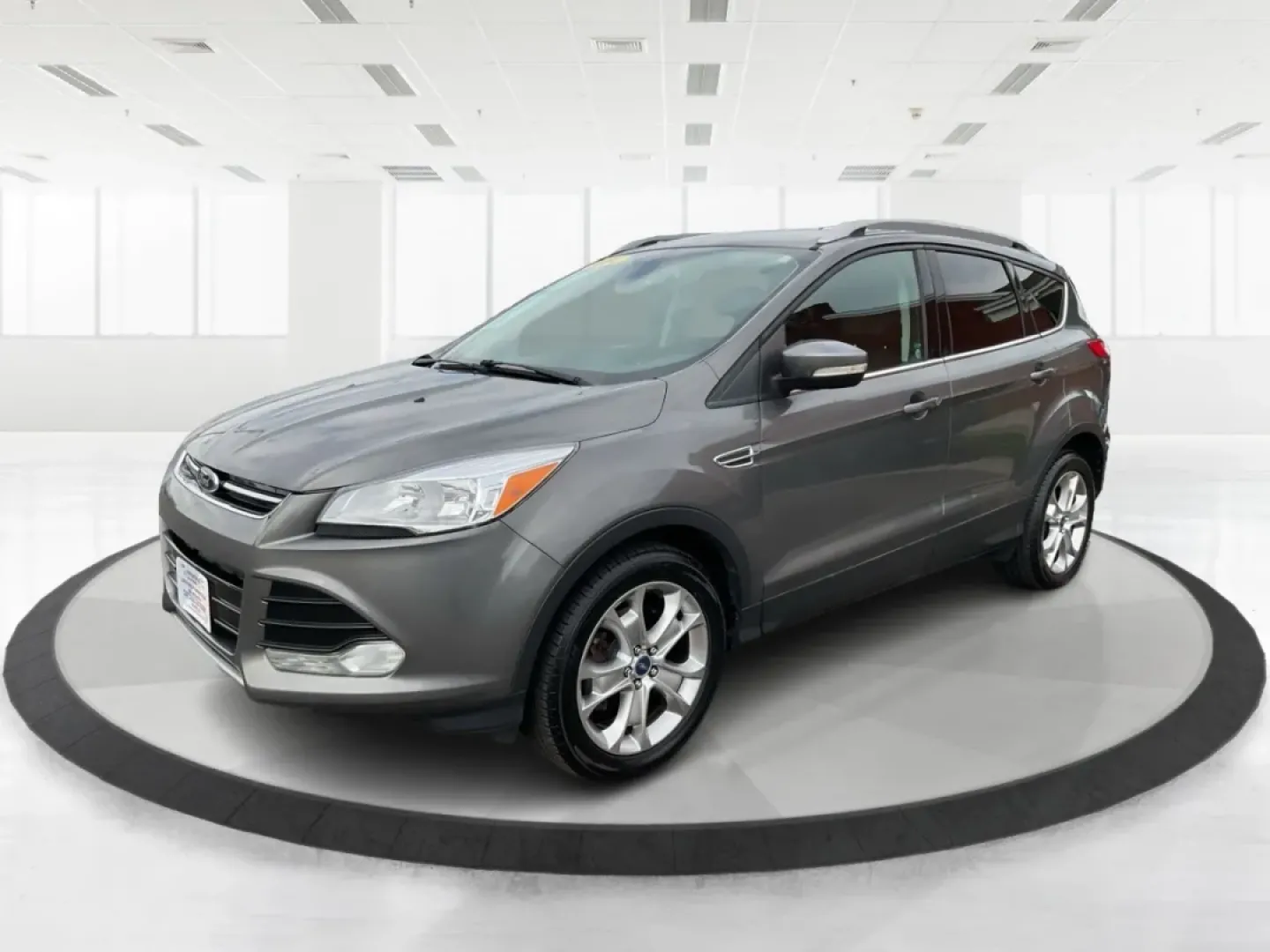 2014 Ford Escape Titanium (1FMCU9J97EU) with an Other engine, located at 401 Woodman Dr, Riverside, OH, 45431, (937) 908-9800, 39.760899, -84.123421 - **Upgrade Your Adventures with the 2014 Ford Escape Titanium at Advantage Car and Credit - Riverside!**<br /> <br /> Are you ready to elevate your weekend getaways or daily commutes with a versatile and stylish SUV? Look no further than the 2014 Ford Escape Titanium, available now at Advantage Car a - Photo#8