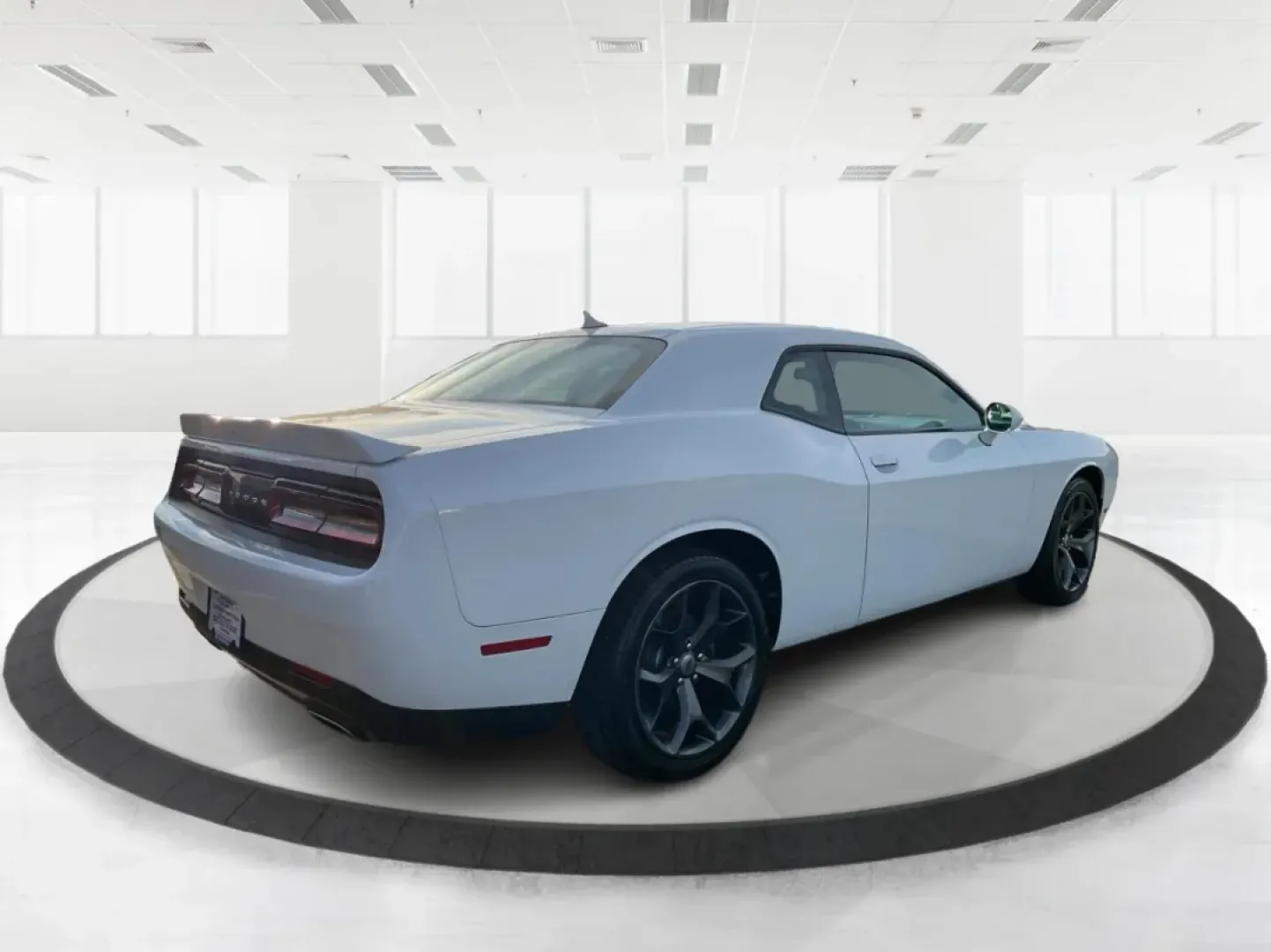 2018 Dodge Challenger SXT Plus (2C3CDZAG0JH) with an Pentastar 3.6L V-6 DOHC engine, located at 8750 N County Rd 25A, Piqua, OH, 45356, (937) 908-9800, 40.164391, -84.232513 - Unleash your inner road warrior with the 2018 Dodge Challenger SXT Plus, the perfect blend of power, style, and everyday functionality. Whether you're tackling the daily commute or planning weekend adventures with friends, this stunning coupe ensures you do it in comfort and confidence. Located at A - Photo#2