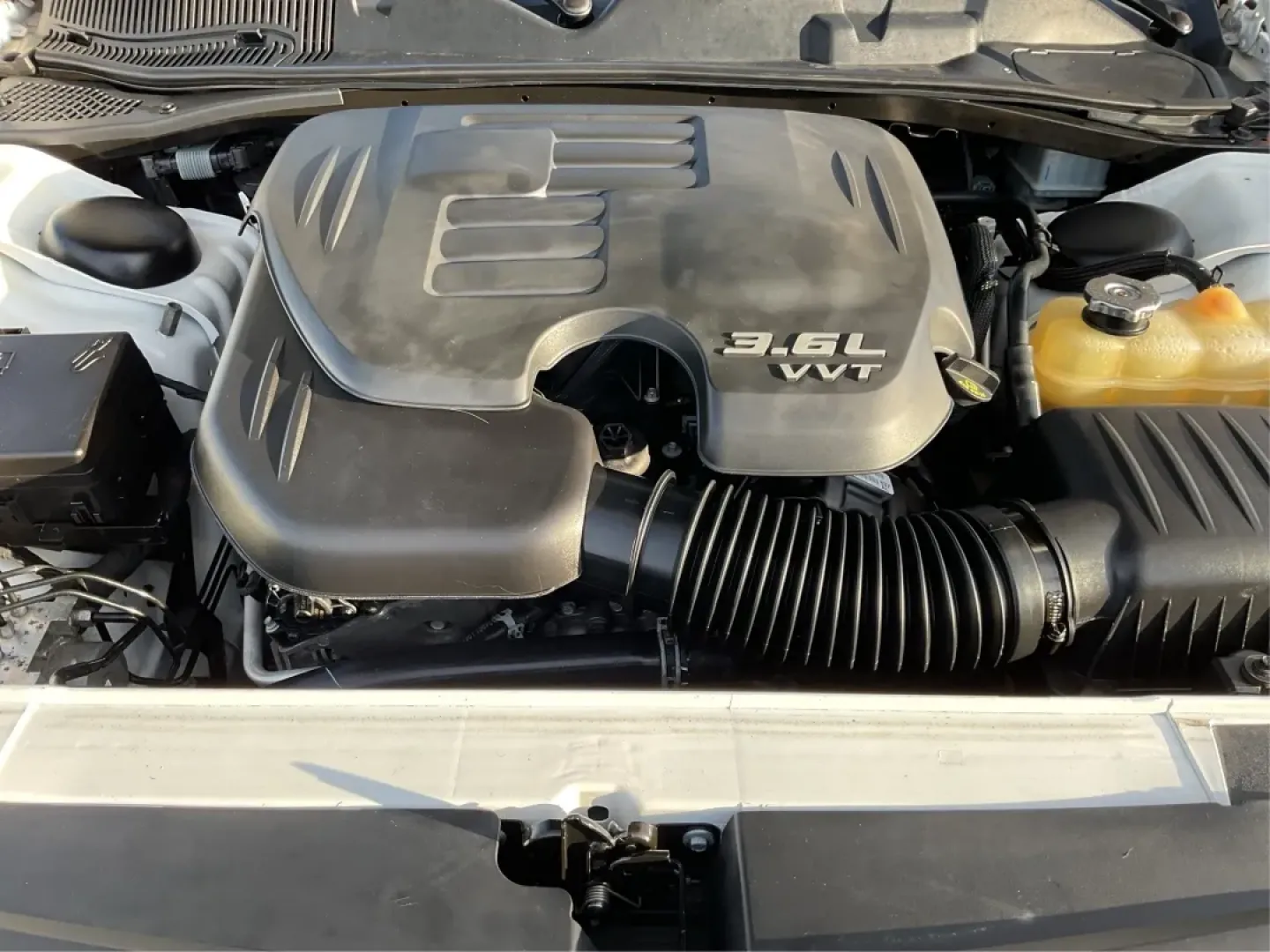 2018 Dodge Challenger SXT Plus (2C3CDZAG0JH) with an Pentastar 3.6L V-6 DOHC engine, located at 8750 N County Rd 25A, Piqua, OH, 45356, (937) 908-9800, 40.164391, -84.232513 - Unleash your inner road warrior with the 2018 Dodge Challenger SXT Plus, the perfect blend of power, style, and everyday functionality. Whether you're tackling the daily commute or planning weekend adventures with friends, this stunning coupe ensures you do it in comfort and confidence. Located at A - Photo#11