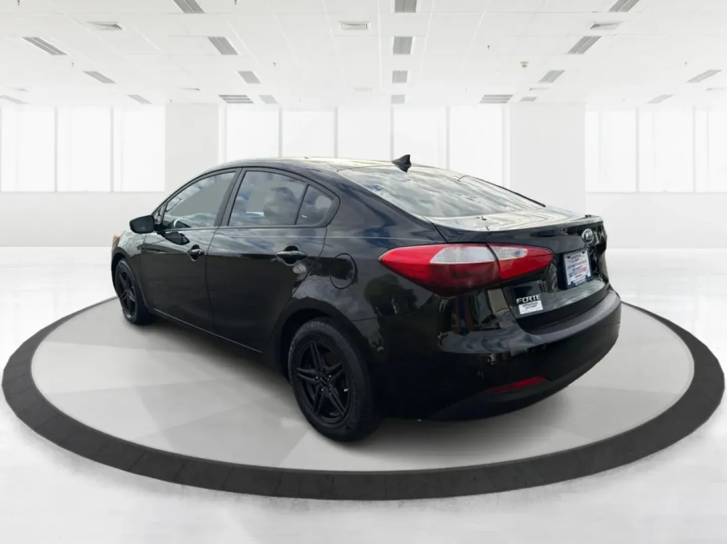 2015 Kia Forte LX (KNAFX4A67F5) with an 1.8L I-4 DOHC engine, located at 1099 N County Rd 25A , Troy, OH, 45373, (937) 908-9800, 40.057079, -84.212883 - Experience the perfect blend of style, comfort, and reliability with the 2015 Kia Forte LX, available now at Advantage Car and Credit in New Carlisle, OH. This sleek sedan is designed to elevate your daily commute and provide the ideal ride for weekend adventures, making it a versatile choice for ev - Photo#4