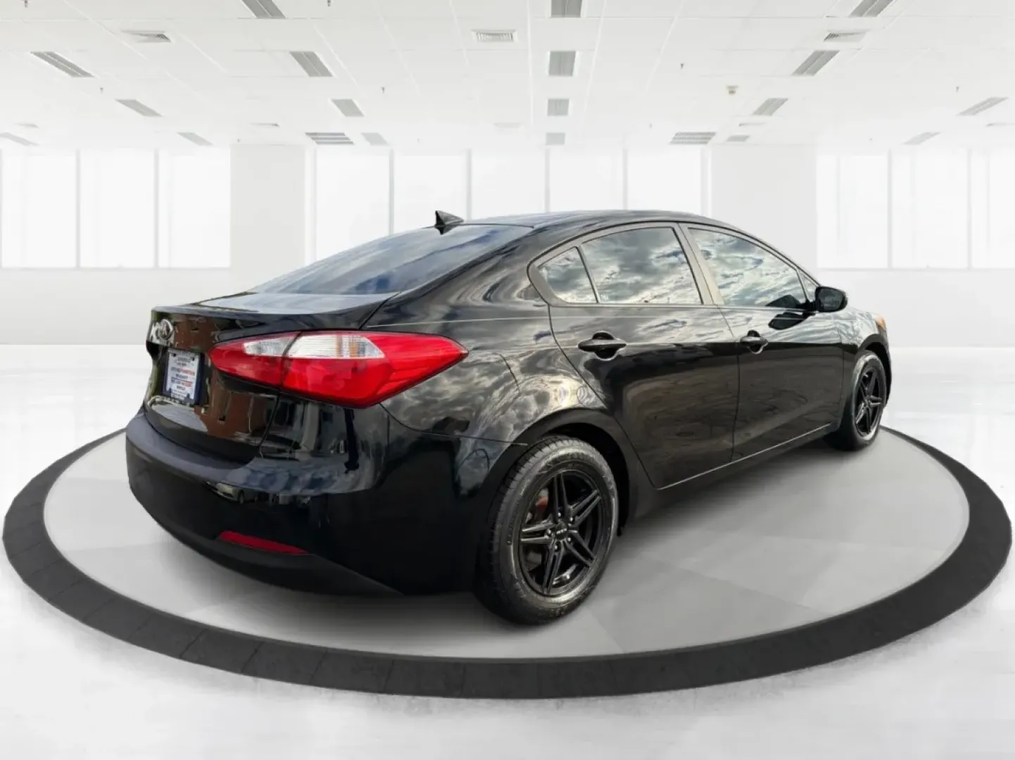 2015 Kia Forte LX (KNAFX4A67F5) with an 1.8L I-4 DOHC engine, 6-Speed Automatic transmission, located at 8750 N County Rd 25A, Piqua, OH, 45356, (937) 908-9800, 40.164391, -84.232513 - Experience the perfect blend of style, comfort, and reliability with the 2015 Kia Forte LX, available now at Advantage Car and Credit in New Carlisle, OH. This sleek sedan is designed to elevate your daily commute and provide the ideal ride for weekend adventures, making it a versatile choice for ev - Photo#2