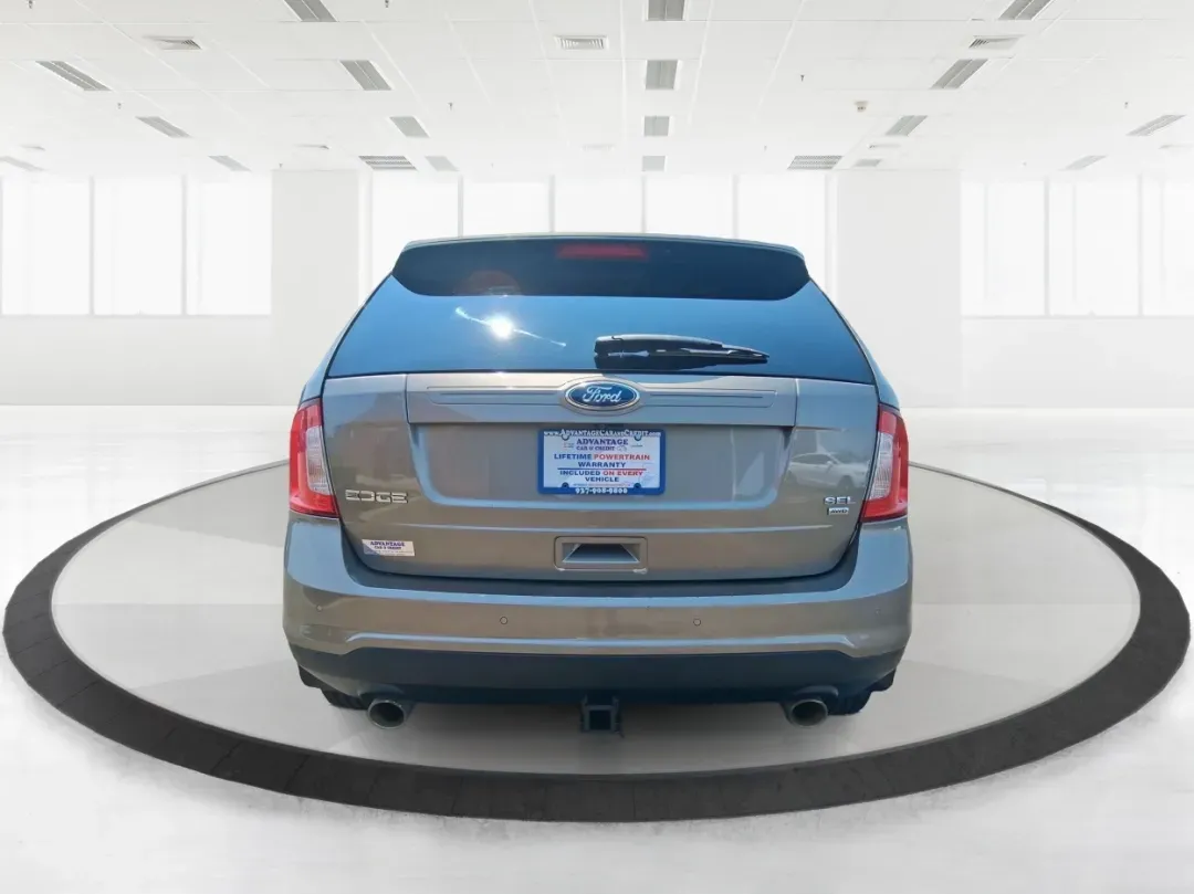 2014 Ford Edge SEL (2FMDK4JCXEB) with an 3.5L V-6 DOHC engine, located at 4508 South Dixie Dr, Moraine, OH, 45439, (937) 908-9800, 39.689976, -84.218452 - Are you searching for the perfect vehicle to elevate your family adventures or enhance your daily commute? Look no further! The 2014 Ford Edge SEL is designed to fit every aspect of your lifestyle, whether you're navigating busy city streets, embarking on weekend getaways, or simply running errands - Photo#3