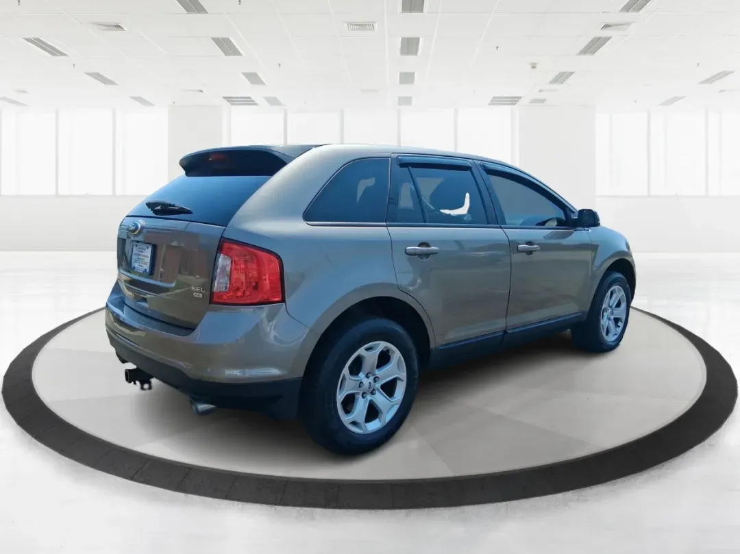 2014 Ford Edge SEL (2FMDK4JCXEB) with an 3.5L V-6 DOHC engine, located at 401 Woodman Dr, Riverside, OH, 45431, (937) 908-9800, 39.760899, -84.123421 - Are you searching for the perfect vehicle to elevate your family adventures or enhance your daily commute? Look no further! The 2014 Ford Edge SEL is designed to fit every aspect of your lifestyle, whether you're navigating busy city streets, embarking on weekend getaways, or simply running errands - Photo#2