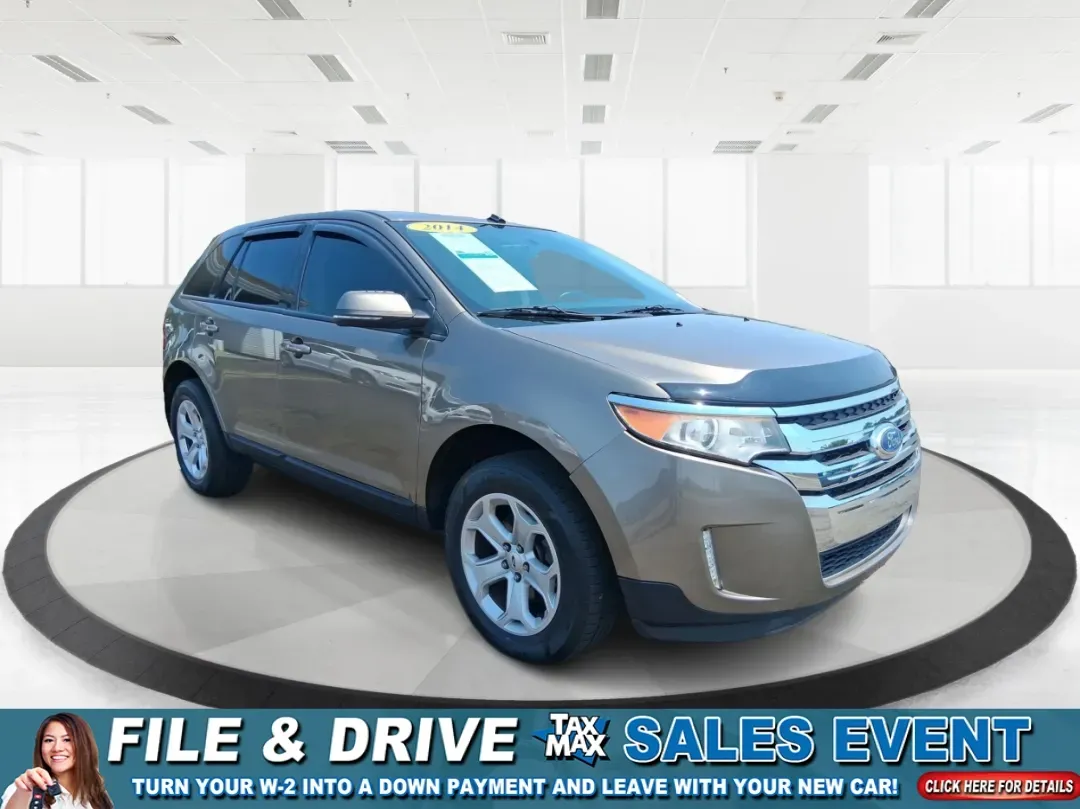 2014 Ford Edge SEL (2FMDK4JCXEB) with an 3.5L V-6 DOHC engine, located at 4508 South Dixie Dr, Moraine, OH, 45439, (937) 908-9800, 39.689976, -84.218452 - Are you searching for the perfect vehicle to elevate your family adventures or enhance your daily commute? Look no further! The 2014 Ford Edge SEL is designed to fit every aspect of your lifestyle, whether you're navigating busy city streets, embarking on weekend getaways, or simply running errands - Photo#0