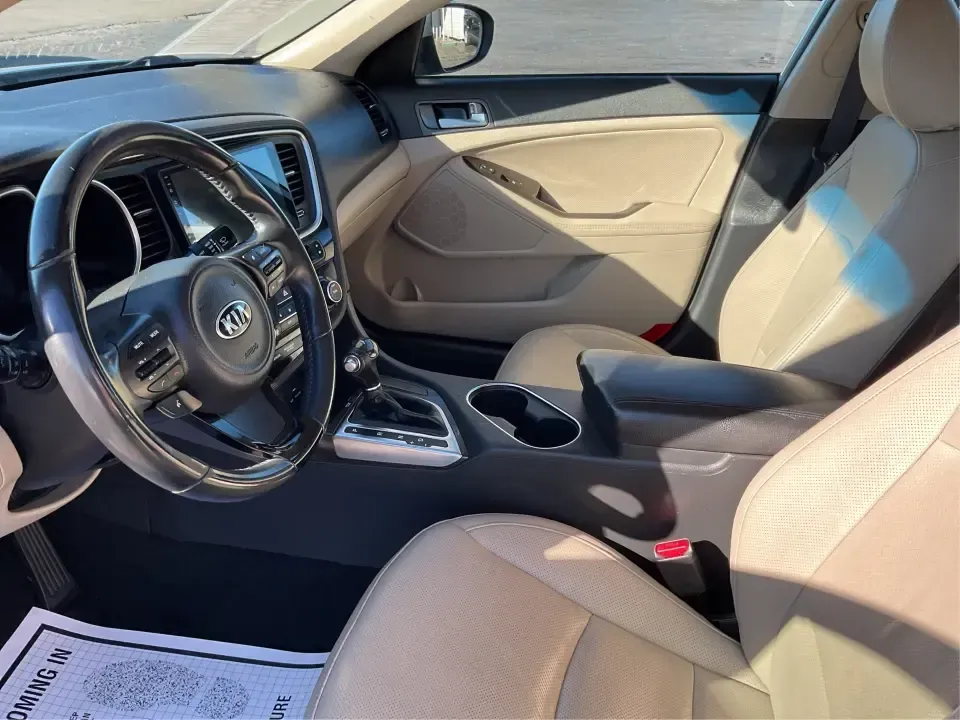 2015 Kia Optima EX (5XXGN4A74FG) with an Theta II 2.4L I-4 gasoline direct injection engine, 6-Speed Automatic transmission, located at 1184 Kauffman Ave, Fairborn, OH, 45324, (937) 908-9800, 39.807072, -84.030914 - Experience the perfect blend of style, comfort, and reliability with this 2015 Kia Optima EX at Advantage Car and Credit in Xenia, OH. Whether you're embarking on daily commutes, family road trips, or simply looking for a trusty companion for your adventures, this vehicle is designed to meet your di - Photo#9