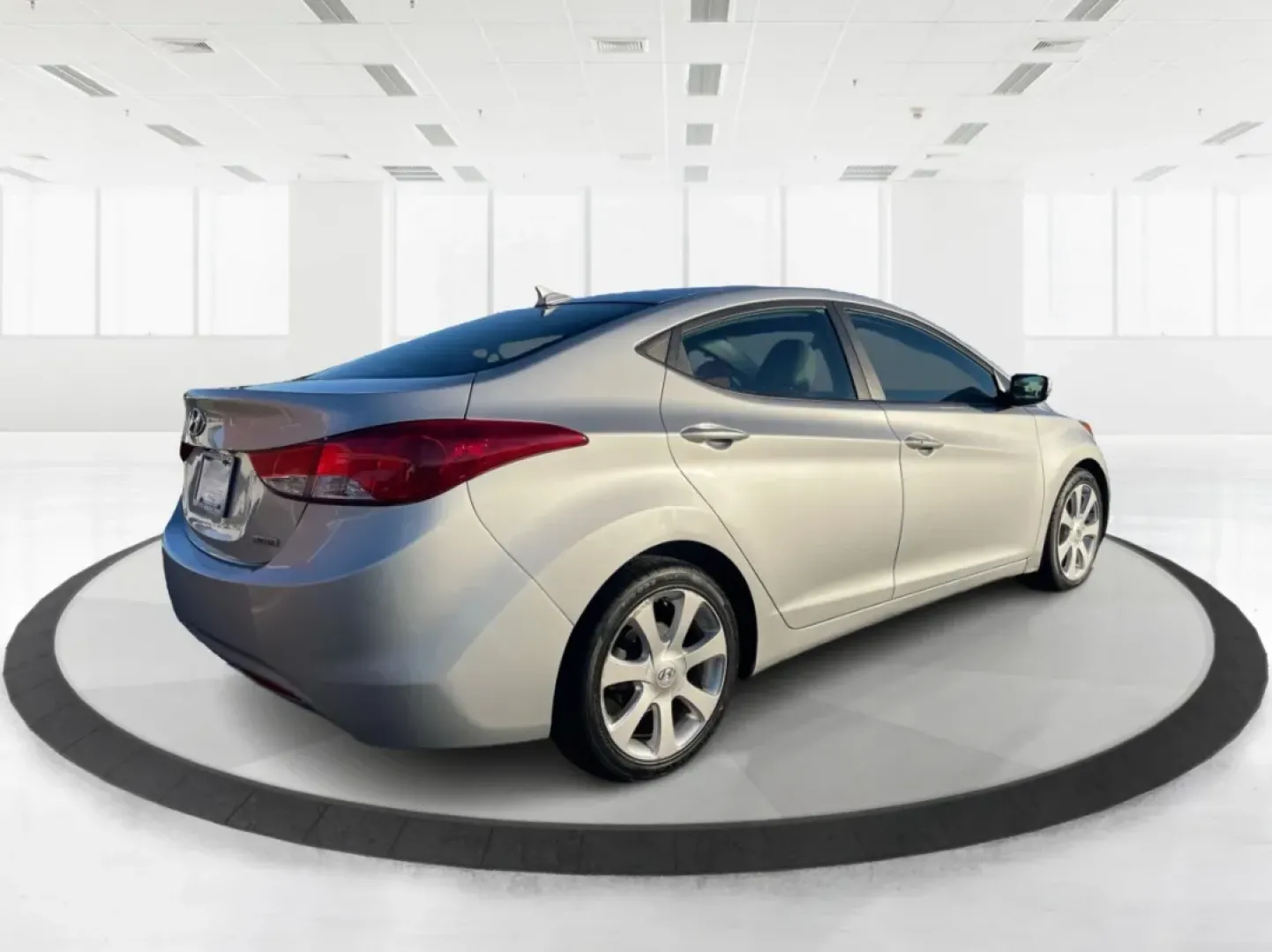 2013 Hyundai Elantra Limited (5NPDH4AE8DH) with an 1.8L I-4 DOHC engine, located at 1099 N County Rd 25A , Troy, OH, 45373, (937) 908-9800, 40.057079, -84.212883 - Elevate your daily commute and family adventures with the versatile and stylish 2013 Hyundai Elantra Limited, available now at Advantage Car and Credit - Troy. This exceptional sedan is designed for those who appreciate a blend of comfort, efficiency, and advanced technology, making it an ideal choi - Photo#2