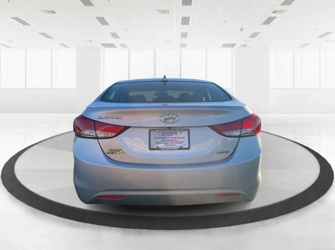 2013 Hyundai Elantra Limited (5NPDH4AE8DH) with an 1.8L I-4 DOHC engine, located at 1099 N County Rd 25A , Troy, OH, 45373, (937) 908-9800, 40.057079, -84.212883 - Elevate your daily commute and family adventures with the versatile and stylish 2013 Hyundai Elantra Limited, available now at Advantage Car and Credit - Troy. This exceptional sedan is designed for those who appreciate a blend of comfort, efficiency, and advanced technology, making it an ideal choi - Photo#3
