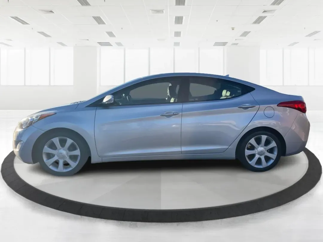 2013 Hyundai Elantra Limited (5NPDH4AE8DH) with an 1.8L I-4 DOHC engine, located at 1099 N County Rd 25A , Troy, OH, 45373, (937) 908-9800, 40.057079, -84.212883 - Elevate your daily commute and family adventures with the versatile and stylish 2013 Hyundai Elantra Limited, available now at Advantage Car and Credit - Troy. This exceptional sedan is designed for those who appreciate a blend of comfort, efficiency, and advanced technology, making it an ideal choi - Photo#5