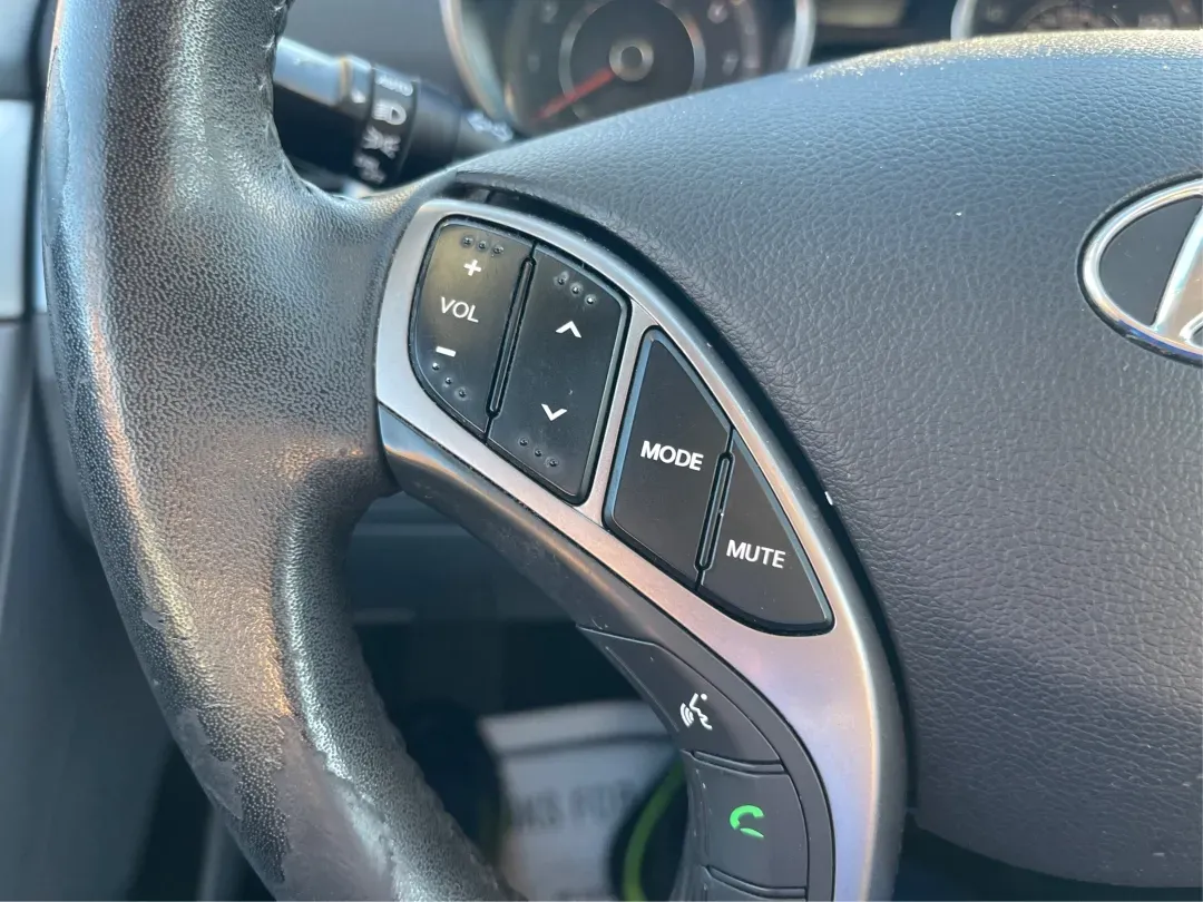 2013 Hyundai Elantra Limited (5NPDH4AE8DH) with an 1.8L I-4 DOHC engine, located at 1099 N County Rd 25A , Troy, OH, 45373, (937) 908-9800, 40.057079, -84.212883 - Elevate your daily commute and family adventures with the versatile and stylish 2013 Hyundai Elantra Limited, available now at Advantage Car and Credit - Troy. This exceptional sedan is designed for those who appreciate a blend of comfort, efficiency, and advanced technology, making it an ideal choi - Photo#16