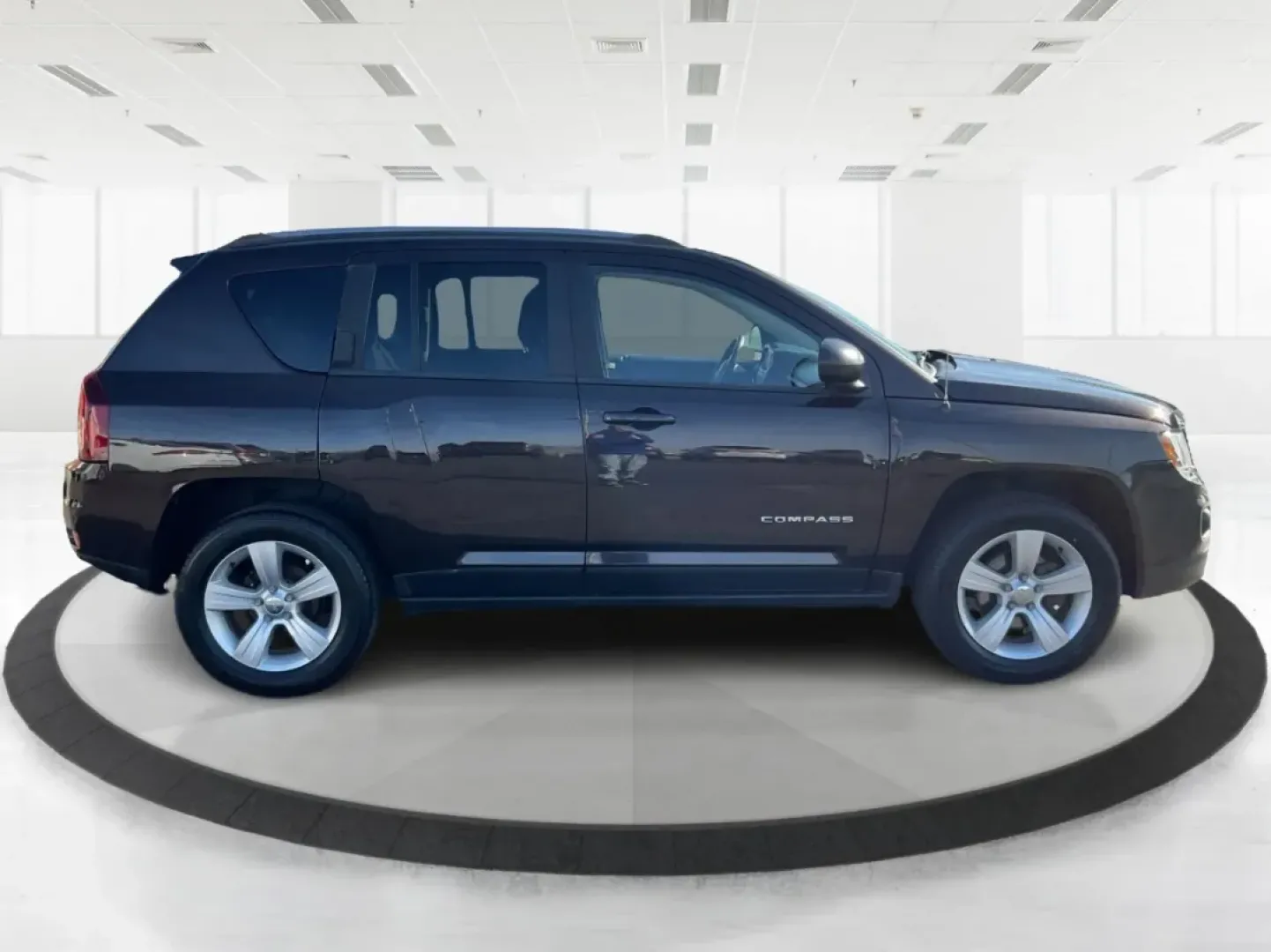 2014 Jeep Compass Sport (1C4NJDBB8ED) with an 2.4L I-4 DOHC engine, located at 1099 N County Rd 25A , Troy, OH, 45373, (937) 908-9800, 40.057079, -84.212883 - Discover the adventure-ready 2014 Jeep Compass, an SUV that's perfect for weekend getaways and daily commutes alike. Whether you're navigating the bustling streets of Troy or heading out on a family road trip to nearby attractions like the Miami County Fair, this rugged vehicle will elevate your dri - Photo#1