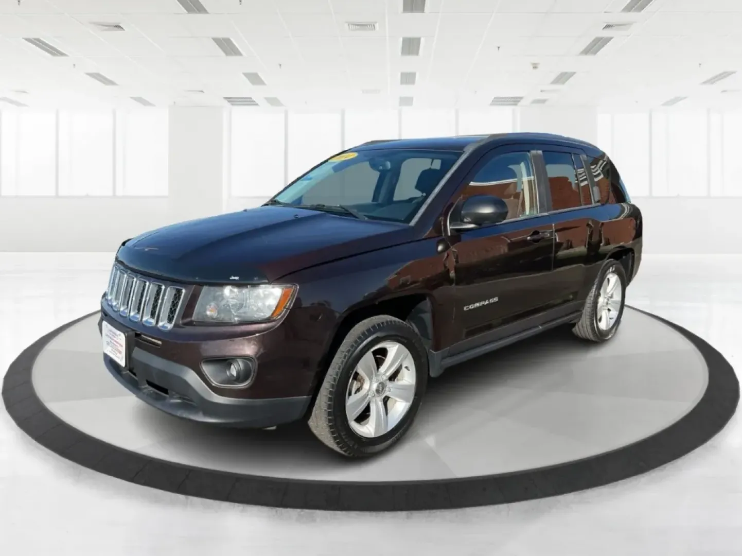 2014 Jeep Compass Sport (1C4NJDBB8ED) with an 2.4L I-4 DOHC engine, located at 1099 N County Rd 25A , Troy, OH, 45373, (937) 908-9800, 40.057079, -84.212883 - Discover the adventure-ready 2014 Jeep Compass, an SUV that's perfect for weekend getaways and daily commutes alike. Whether you're navigating the bustling streets of Troy or heading out on a family road trip to nearby attractions like the Miami County Fair, this rugged vehicle will elevate your dri - Photo#8