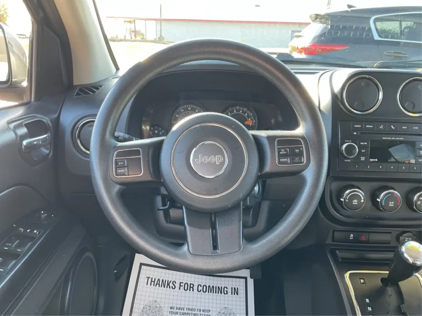 2014 Jeep Compass Sport (1C4NJDBB8ED) with an 2.4L I-4 DOHC engine, located at 1099 N County Rd 25A , Troy, OH, 45373, (937) 908-9800, 40.057079, -84.212883 - Discover the adventure-ready 2014 Jeep Compass, an SUV that's perfect for weekend getaways and daily commutes alike. Whether you're navigating the bustling streets of Troy or heading out on a family road trip to nearby attractions like the Miami County Fair, this rugged vehicle will elevate your dri - Photo#16