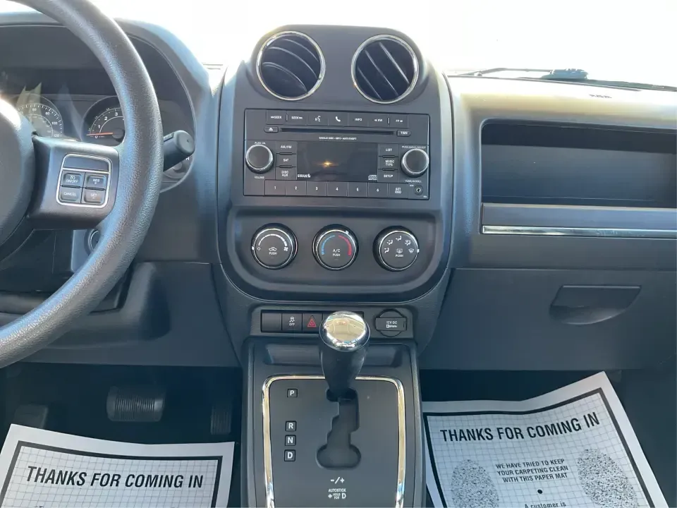 2016 Jeep Patriot Sport 2WD (1C4NJPBB6GD) with an 2.4L L4 DOHC 16V engine, Automatic transmission, located at 1951 S Dayton Lakeview Rd., New Carlisle, OH, 45344, (937) 908-9800, 39.890999, -84.050255 - Pack up the kids, load the cooler, and point the hood toward a weekend at Buck Creek State Park or an easy day trip to downtown Dayton-this 2016 Jeep Patriot Sport is the kind of compact SUV that fits real life in New Carlisle. With classic Jeep styling, practical cargo space, and everyday-friendly - Photo#13