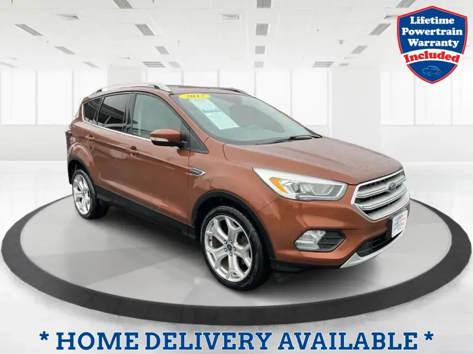 2017 Ford Escape Titanium 4WD (1FMCU9J94HU) with an 2.0L L4 DOHC 16V engine, 6A transmission, located at 8750 N County Rd 25A, Piqua, OH, 45356, (937) 908-9800, 40.164391, -84.232513 - Load up the family, point the hood toward Indian Lake for a weekend escape, or make your daily commute down I75 feel a lot more comfortable-this 2017 Ford Escape Titanium 4WD is the kind of compact SUV that fits real life in Piqua, OH. With confident four-wheel drive for unpredictable Midwest weathe - Photo#0