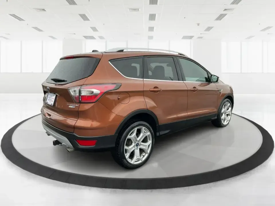 2017 Ford Escape Titanium 4WD (1FMCU9J94HU) with an 2.0L L4 DOHC 16V engine, 6A transmission, located at 8750 N County Rd 25A, Piqua, OH, 45356, (937) 908-9800, 40.164391, -84.232513 - Load up the family, point the hood toward Indian Lake for a weekend escape, or make your daily commute down I75 feel a lot more comfortable-this 2017 Ford Escape Titanium 4WD is the kind of compact SUV that fits real life in Piqua, OH. With confident four-wheel drive for unpredictable Midwest weathe - Photo#2