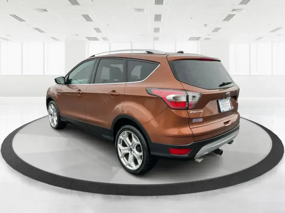 2017 Ford Escape Titanium 4WD (1FMCU9J94HU) with an 2.0L L4 DOHC 16V engine, 6A transmission, located at 8750 N County Rd 25A, Piqua, OH, 45356, (937) 908-9800, 40.164391, -84.232513 - Load up the family, point the hood toward Indian Lake for a weekend escape, or make your daily commute down I75 feel a lot more comfortable-this 2017 Ford Escape Titanium 4WD is the kind of compact SUV that fits real life in Piqua, OH. With confident four-wheel drive for unpredictable Midwest weathe - Photo#4