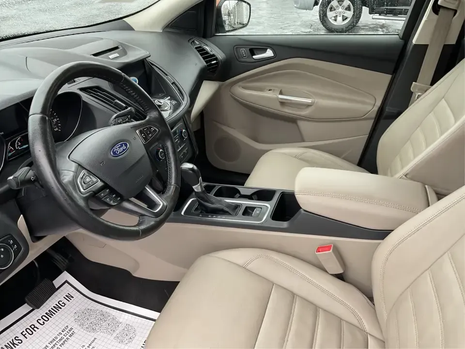 2017 Ford Escape Titanium 4WD (1FMCU9J94HU) with an 2.0L L4 DOHC 16V engine, 6A transmission, located at 8750 N County Rd 25A, Piqua, OH, 45356, (937) 908-9800, 40.164391, -84.232513 - Load up the family, point the hood toward Indian Lake for a weekend escape, or make your daily commute down I75 feel a lot more comfortable-this 2017 Ford Escape Titanium 4WD is the kind of compact SUV that fits real life in Piqua, OH. With confident four-wheel drive for unpredictable Midwest weathe - Photo#9